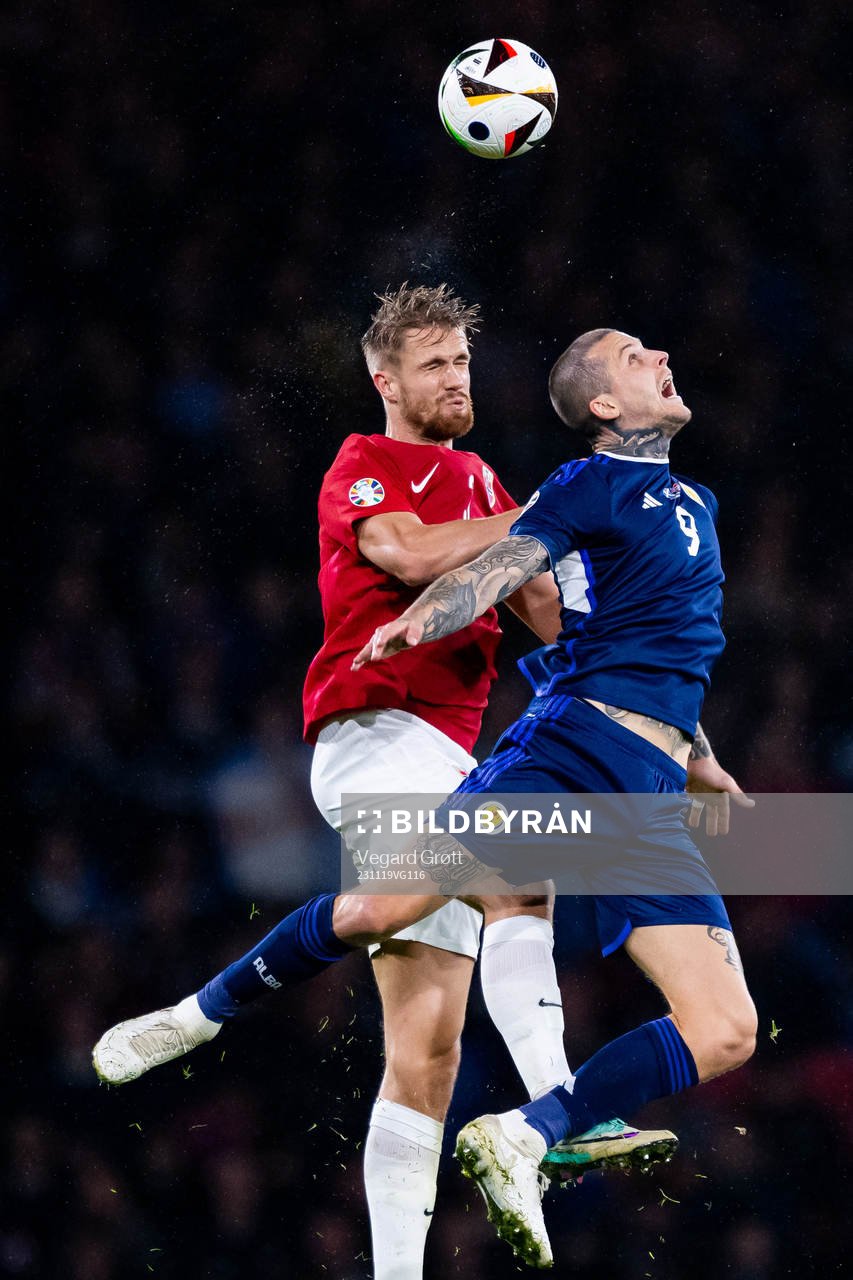 Kristoffer Ajer of Norway and Lyndon Dykes of Scotland