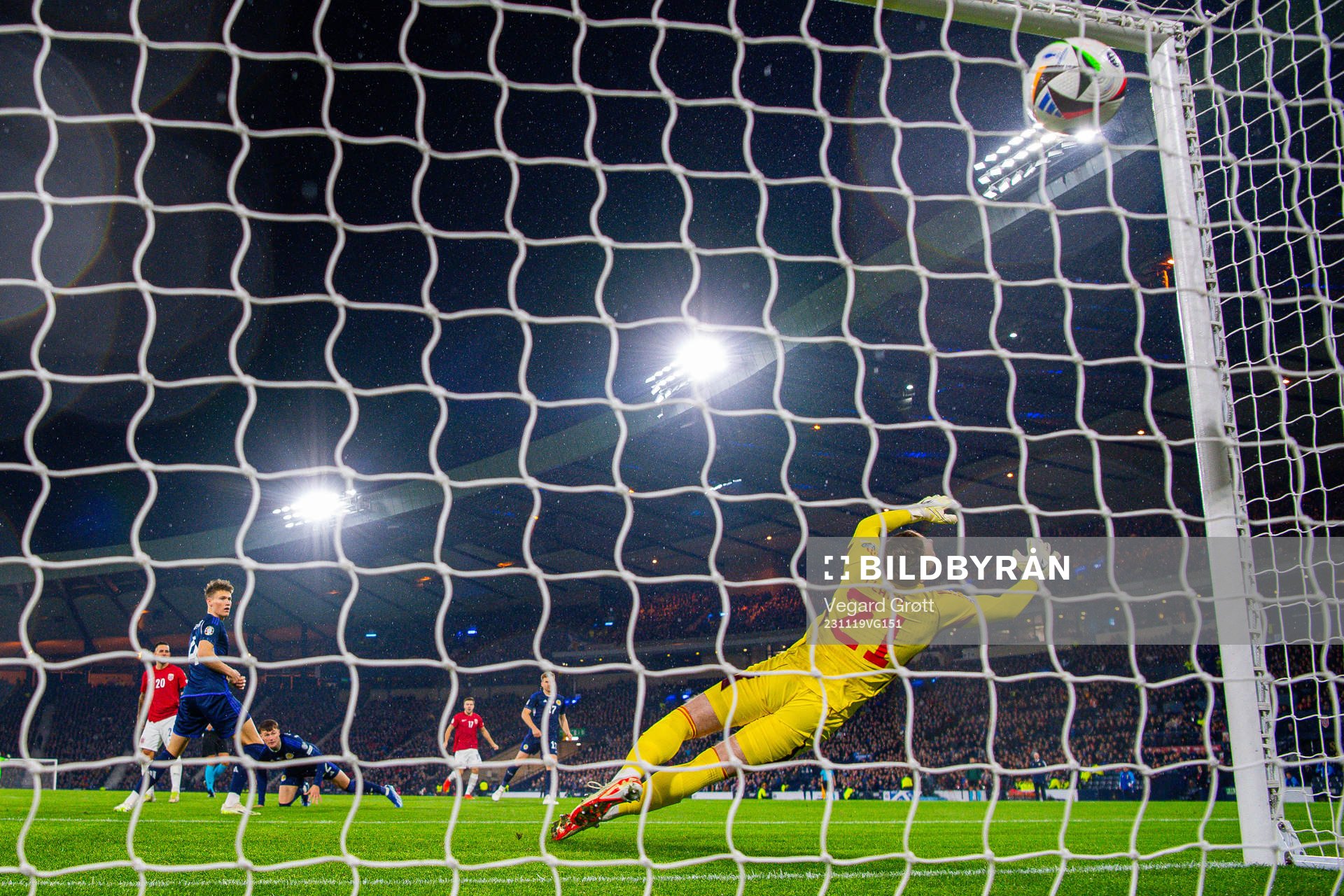 Aron Dønnum of Norway scores the 0-1 goal past goalkeeper