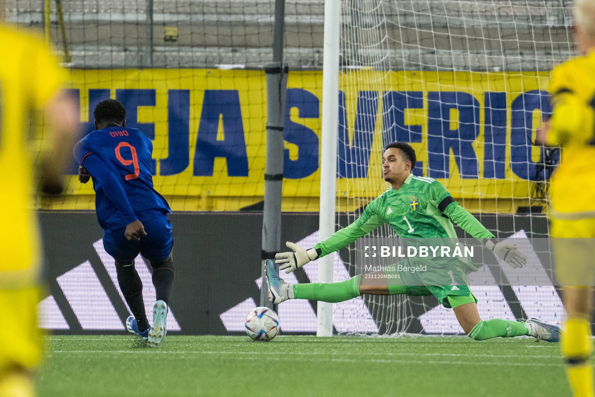 Noah Ohio of Netherlands and Goalkeeper Oliver Dovin of