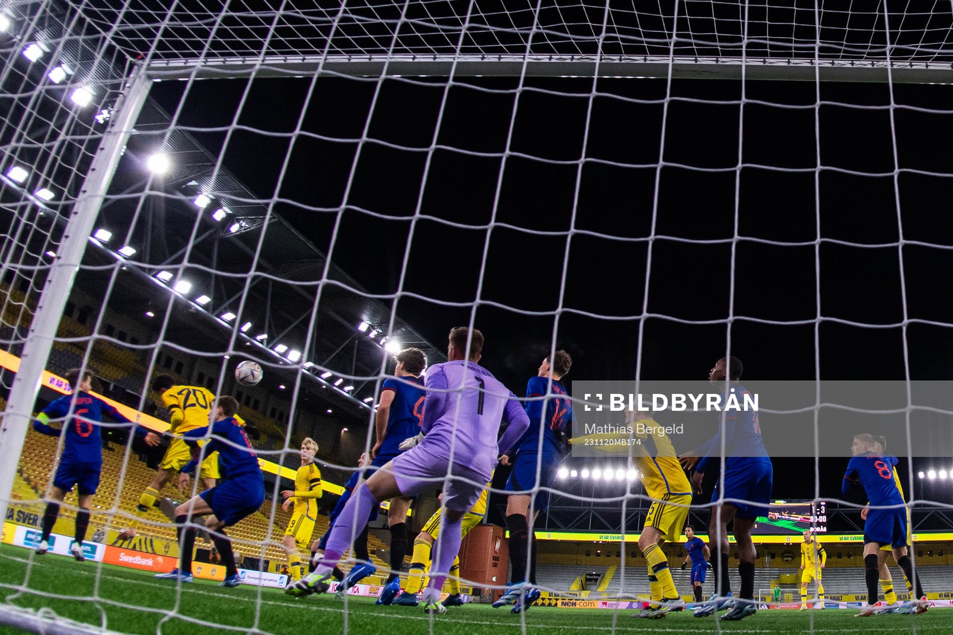 Joakim Persson of Sweden scores 2-3 behind goalkeeper