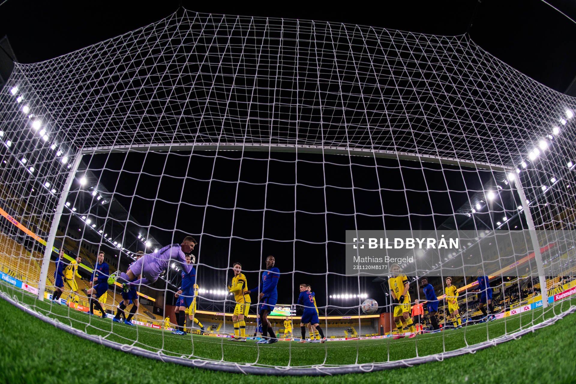 Joakim Persson of Sweden scores 2-3 behind goalkeeper