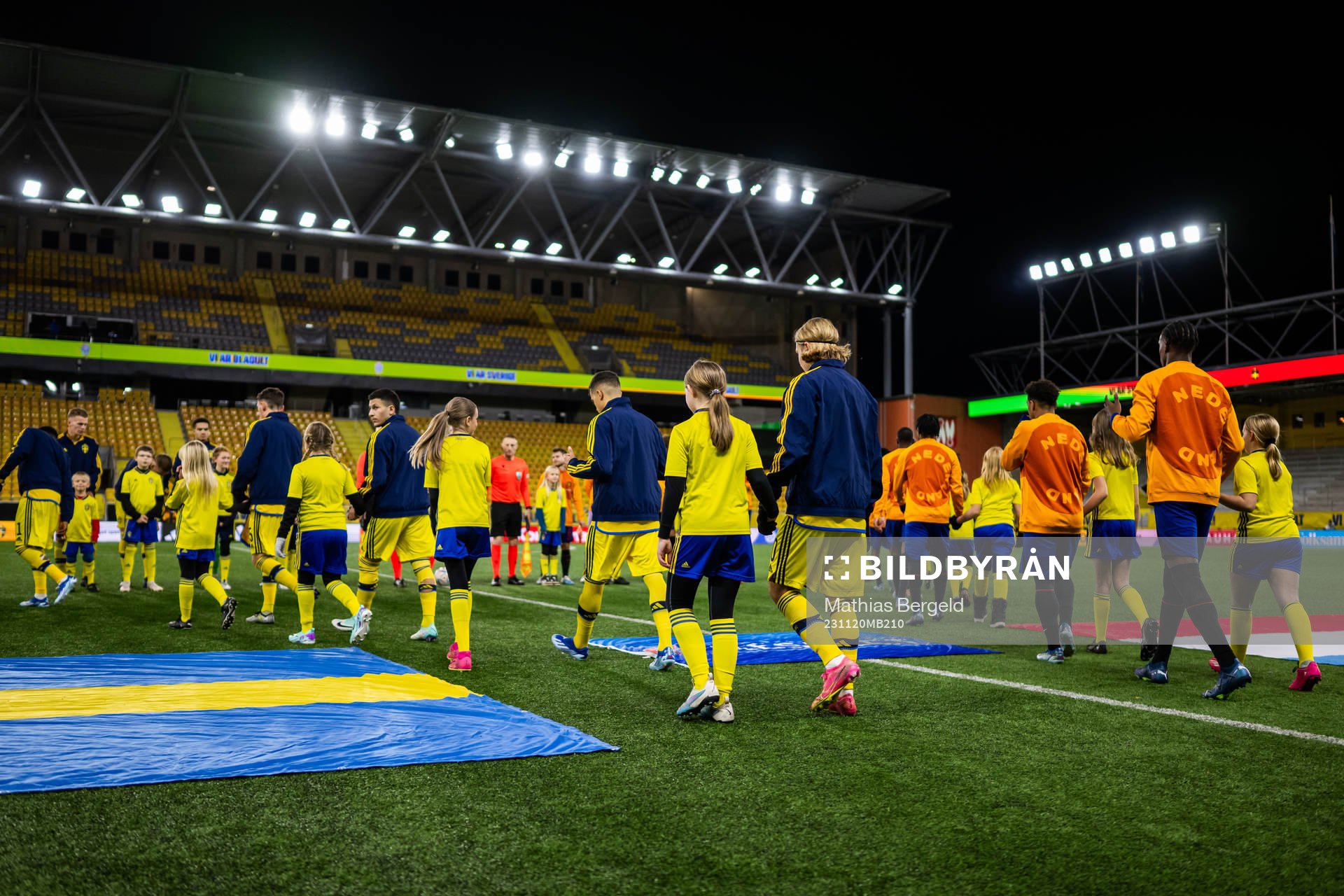 Players of Sweden enter the pitch