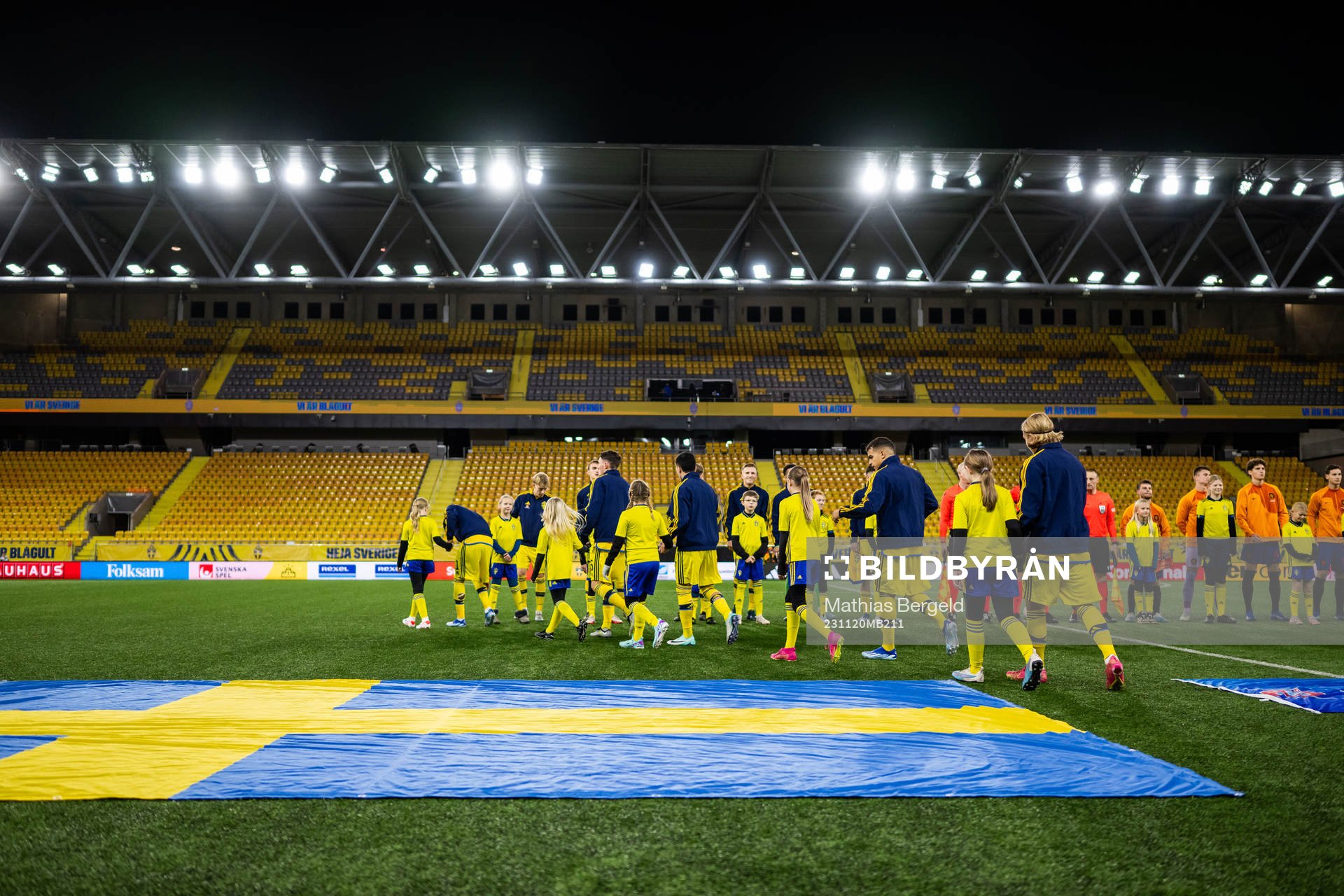 Players of Sweden enter the pitch