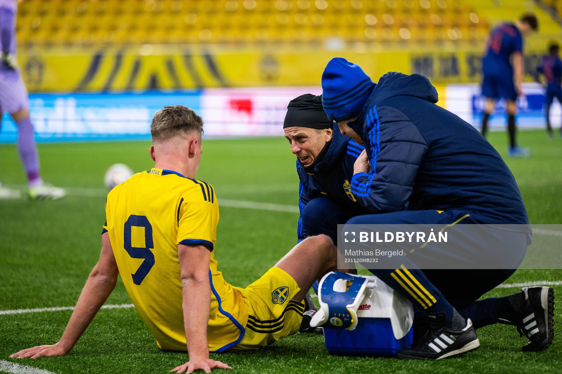 Joel Voelkerling Persson of Sweden is seen to by medical
