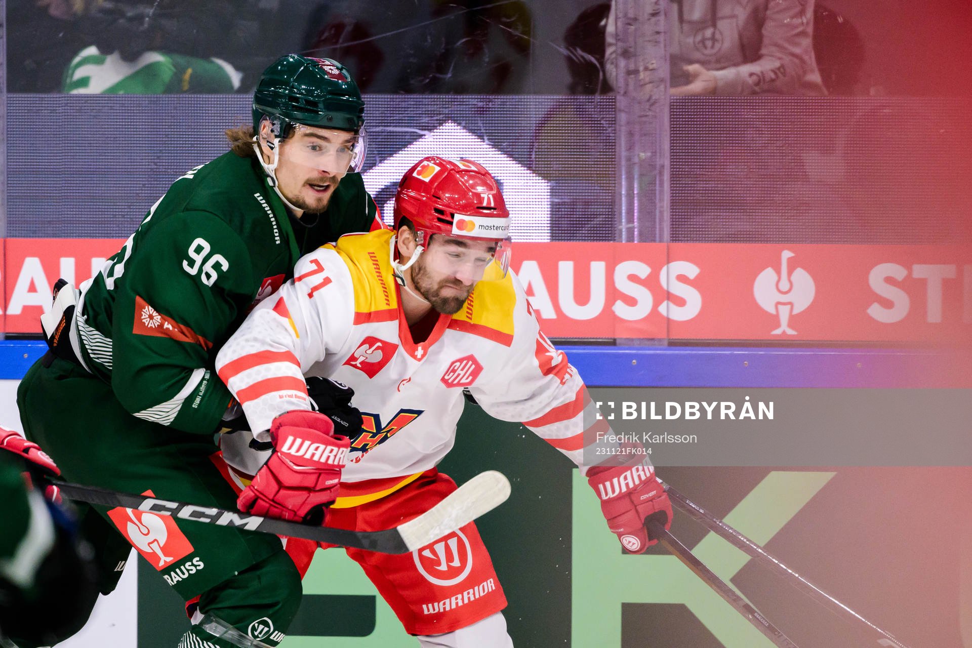 David Tomasek of Färjestad and Yanik Burren of EHC Biel