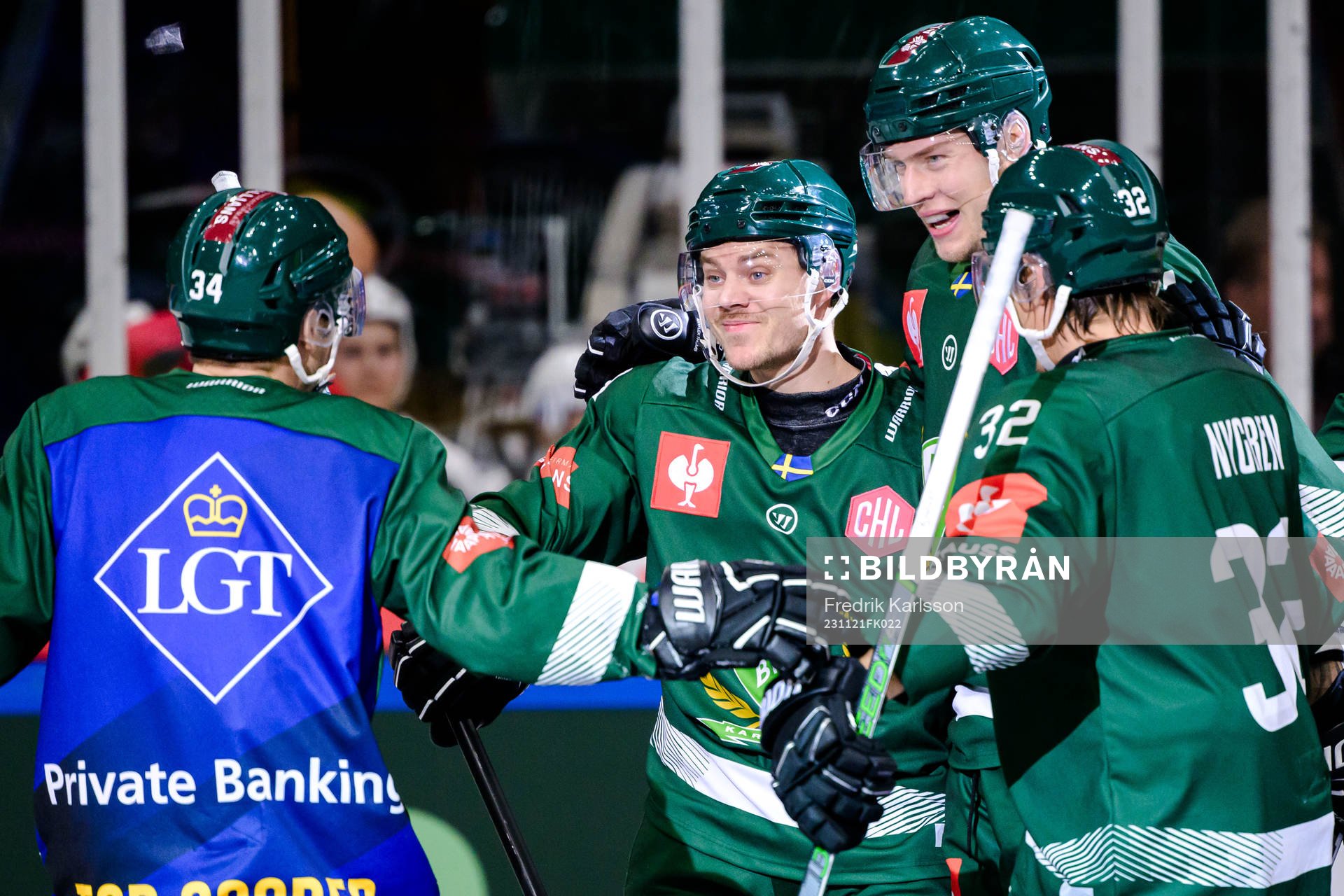 Joel Kellman and Victor Ejdsell of Färjestad celebrate