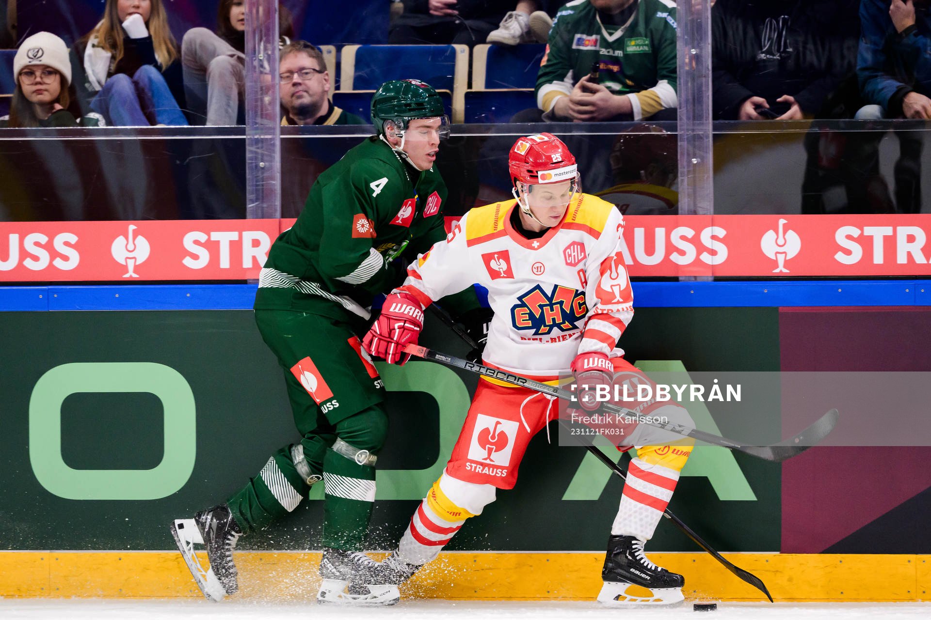 Oscar Lawner of Färjestad and Toni Rajala of EHC Biel