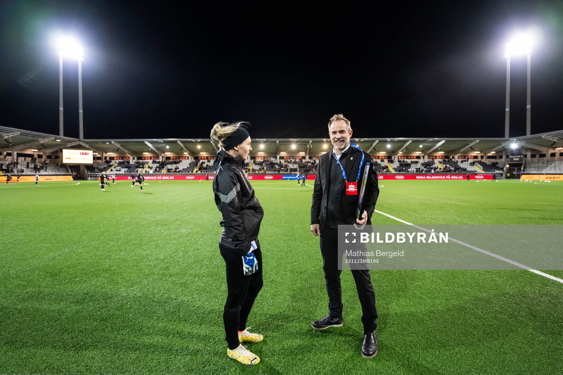 Goalkeeper Jennifer Falk of Häcken receives a picture from