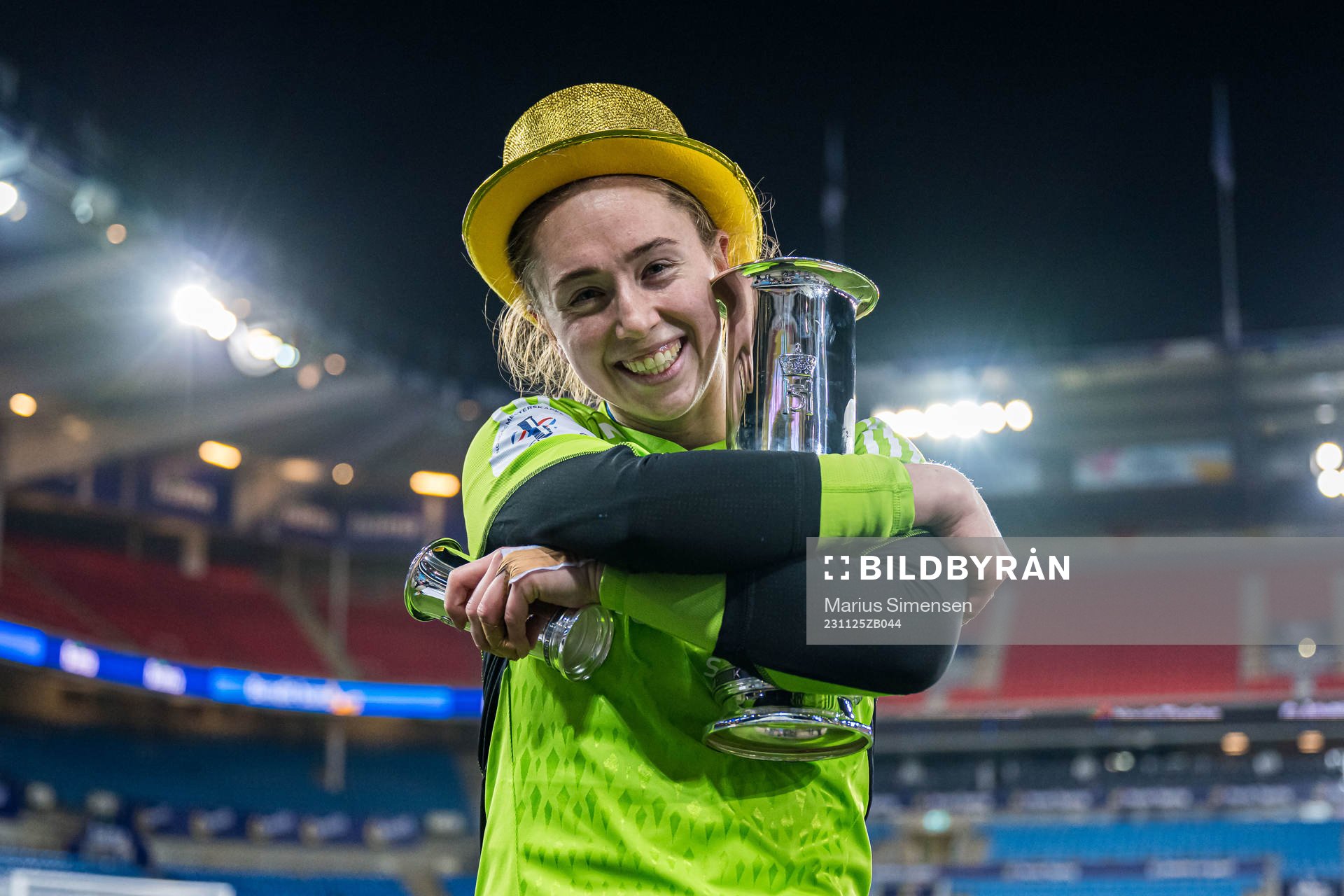 Karen Oline Sneve of Rosenborg celebrates with the trophy