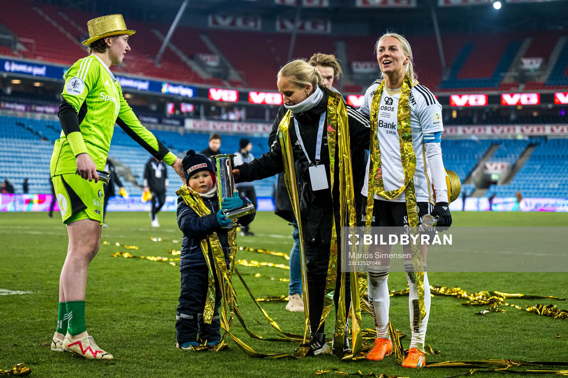 Lene Christensen, Maria Olsvik and Mali Lilleås Næss of Rosenborg celebrates with the trophy after the cup final between Rosenborg and Vålerenga on November 25, 2023 in Oslo.
