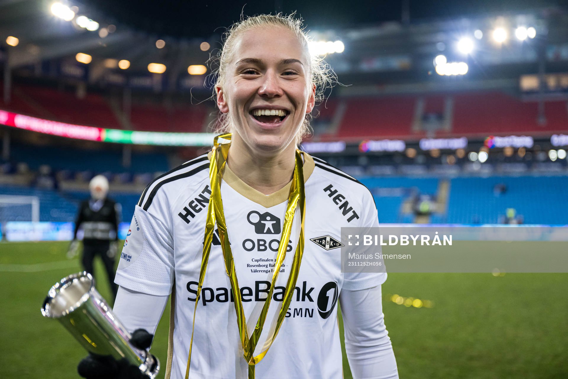 Emilie Nautnes of Rosenborg celebrates with the trophy
