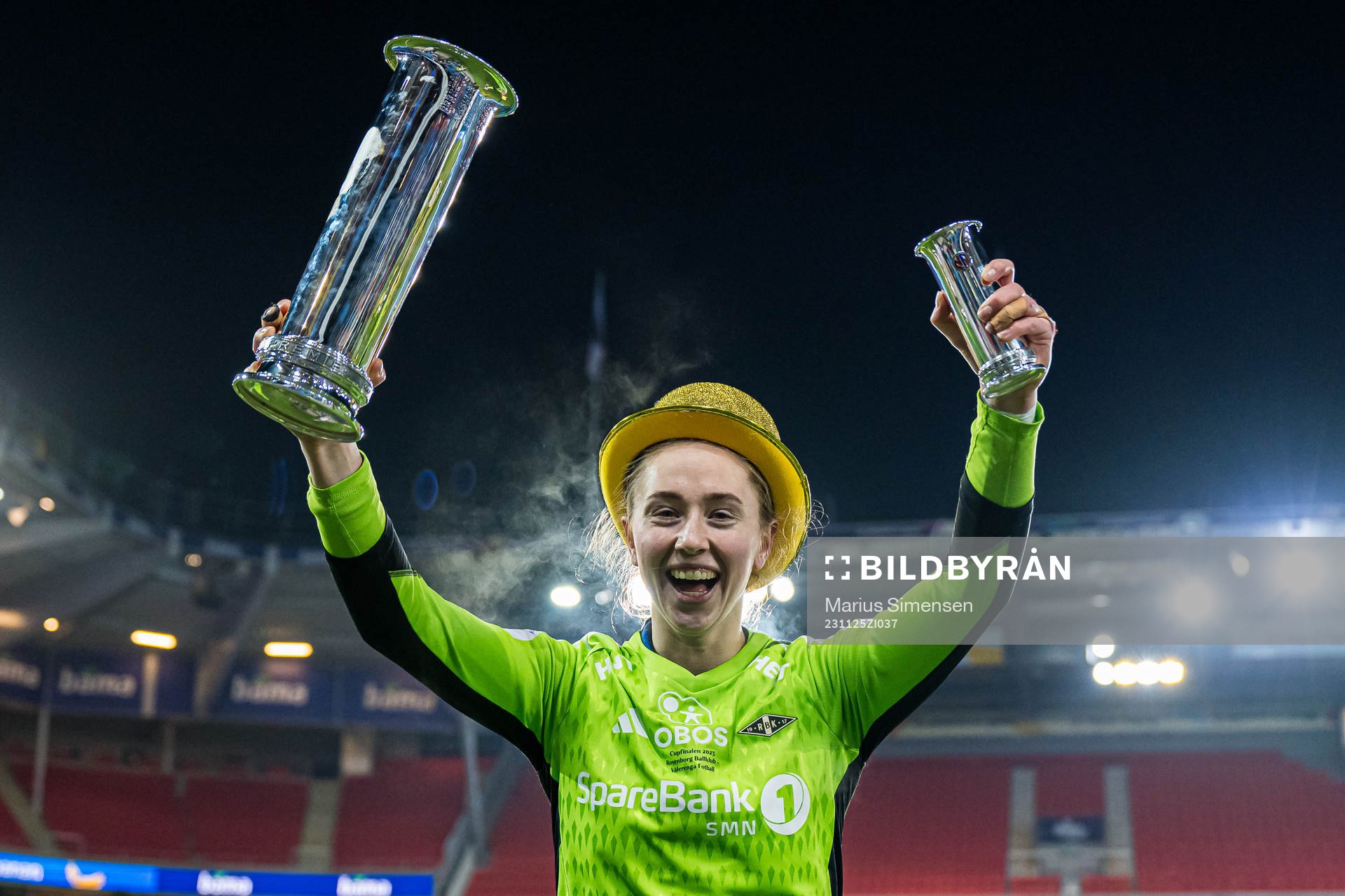 Karen Oline Sneve of Rosenborg celebrates with the trophy