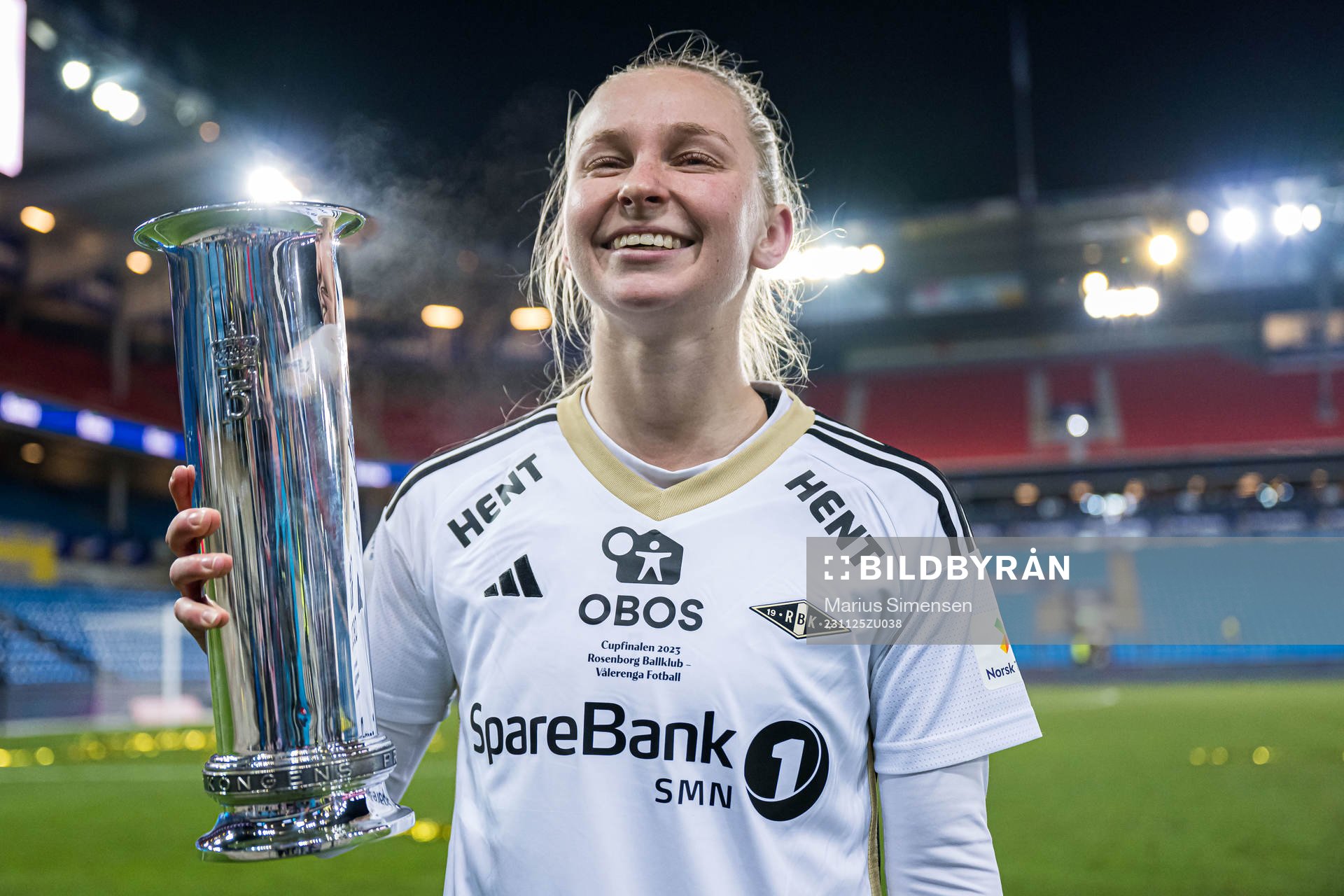 Emilie Marie Joramo of Rosenborg celebrates with the trophy