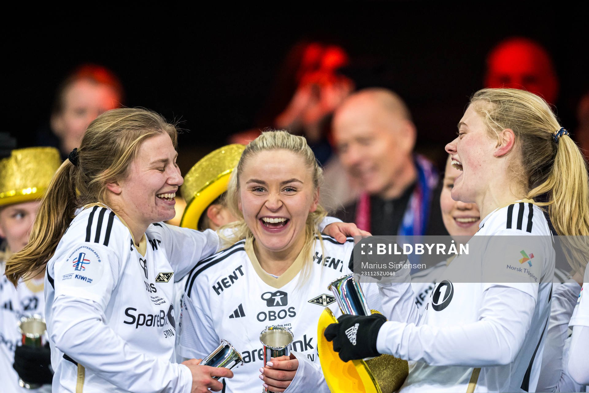Cesilie Andreassen, Anna Jøsendal and Mathilde Harviken of Rosenborg celebrates with the trophy after the cup final between Rosenborg and Vålerenga on November 25, 2023 in Oslo.