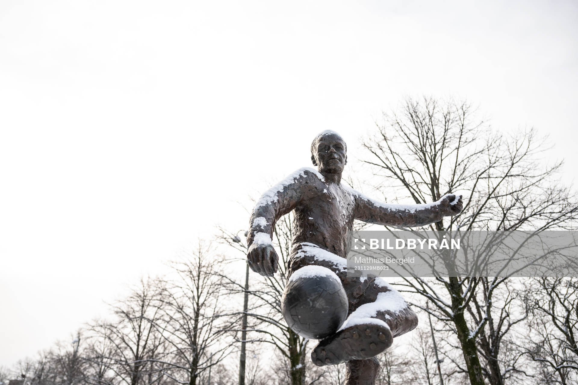 A statue covered in snow outside Gamla Ullevi
