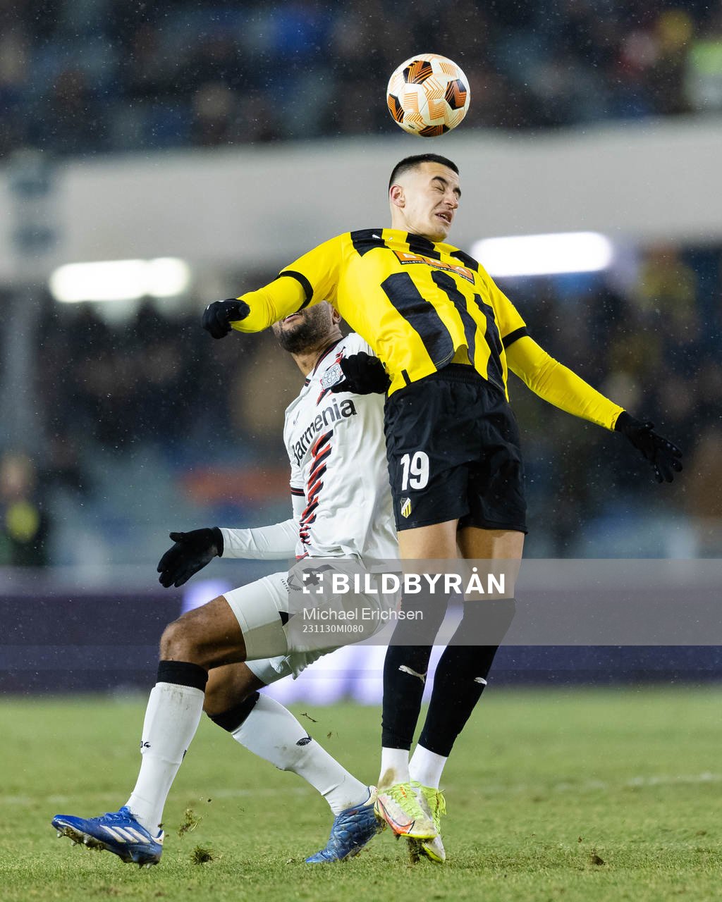 Jonathan Tah of Bayer Leverkusen and Srdjan Hrstic of BK
