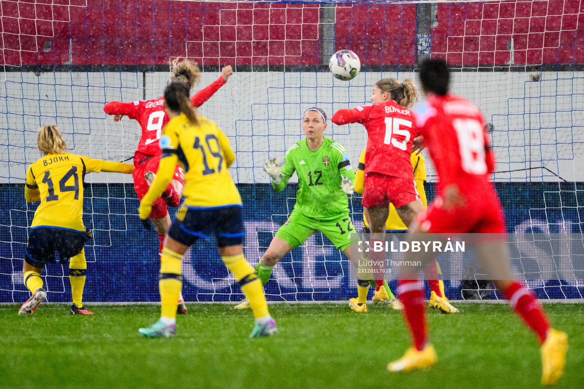 Ana-Maria Crnogorcevic of Switzerland scores 1-0 behind goalkeeper Jennifer Falk of Sweden during the UEFA Women's Nations League football match between Switzerland and Sweden on December 1, 2023 in Lucerne.