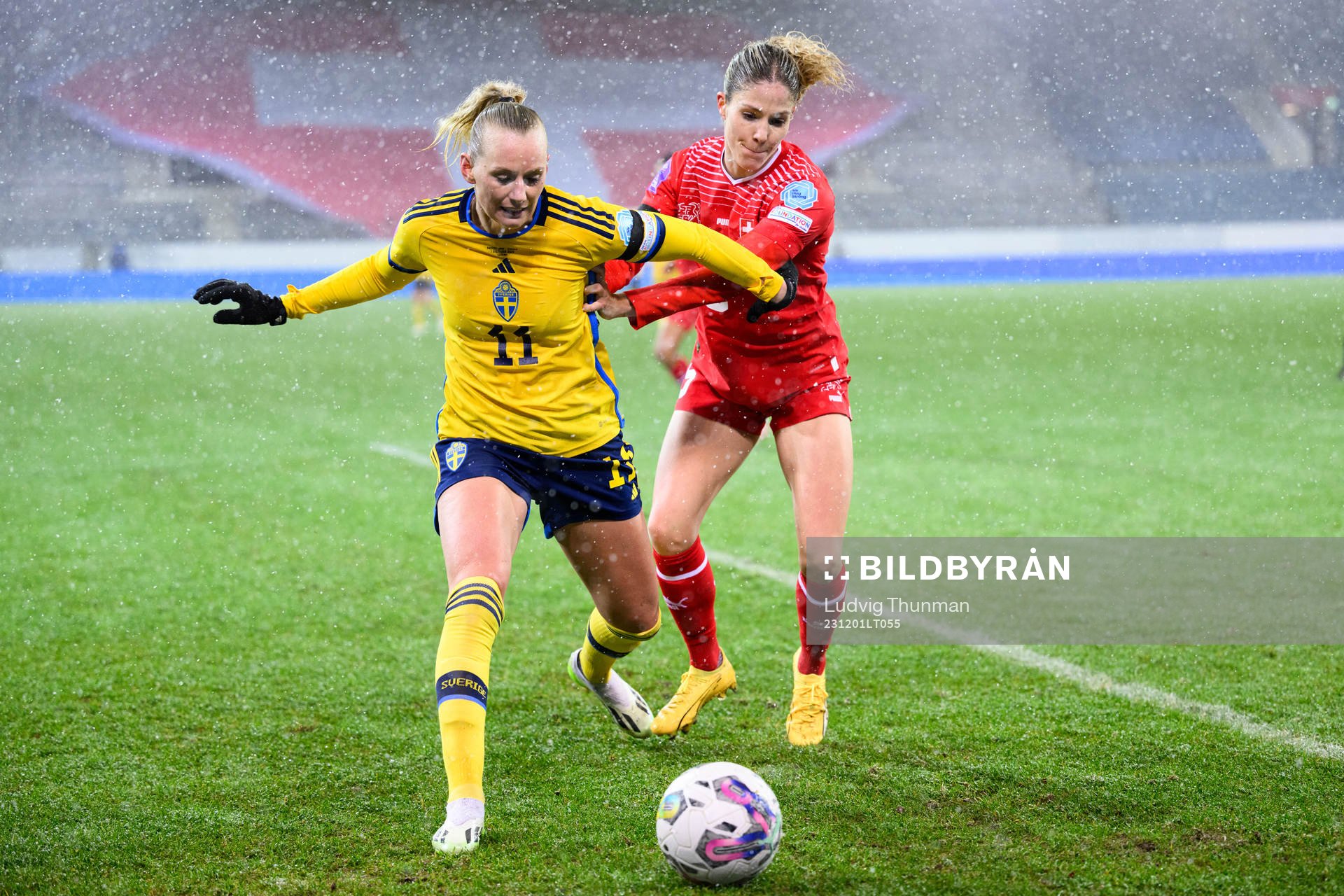Stina Blackstenius of Sweden and Luana Buhler of Switzerland