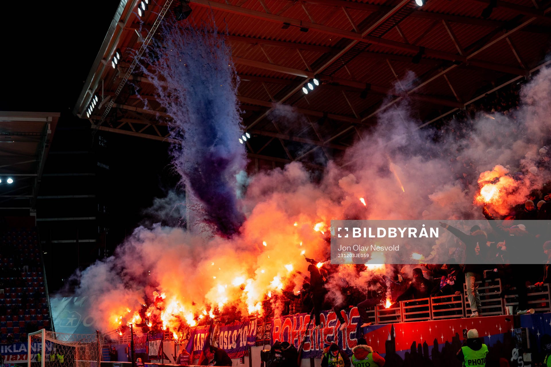 Supporters of Vålerenga with pyro effects