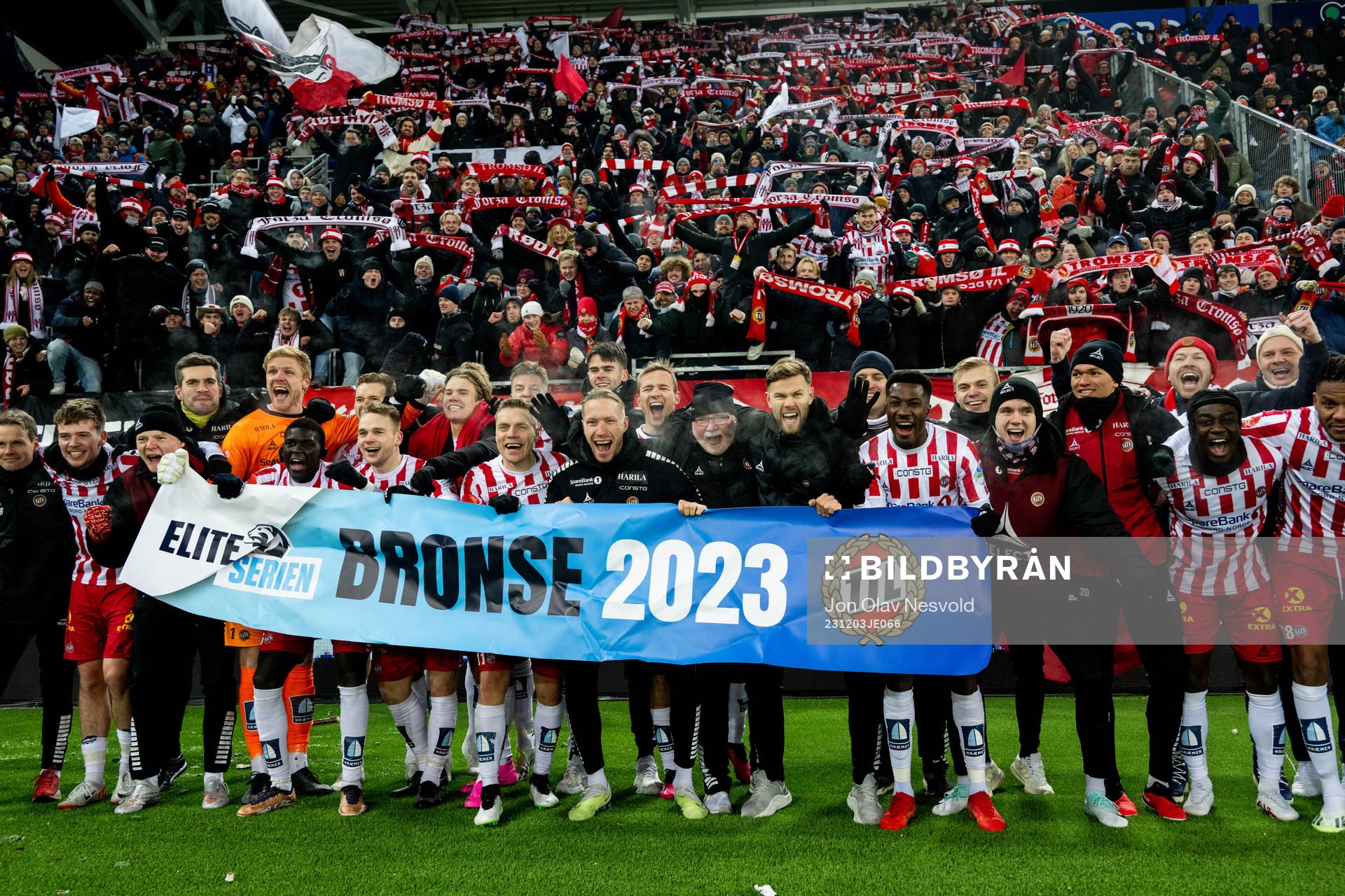 Players of Tromsø celebrate the bronze medal