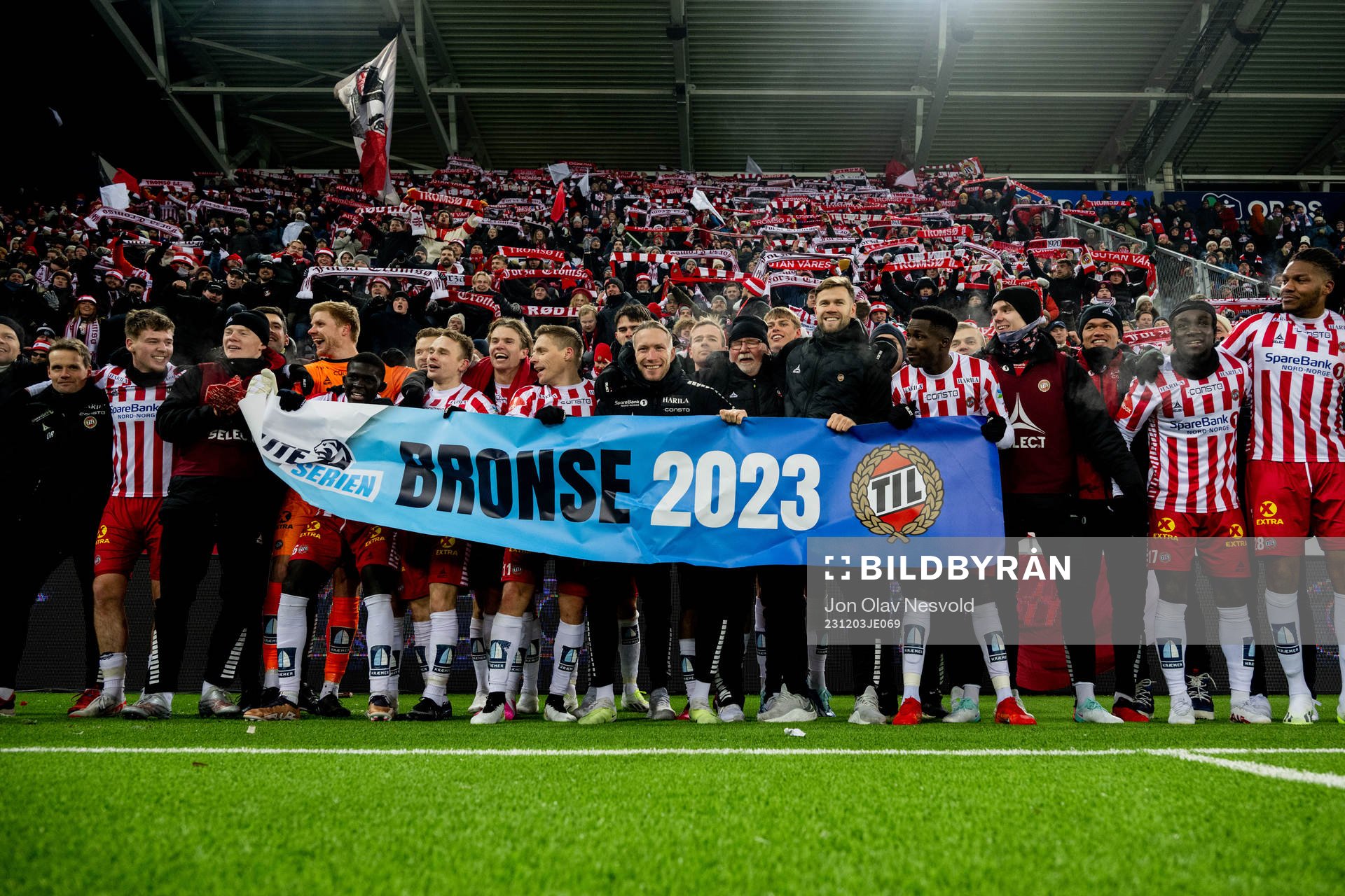 Players of Tromsø celebrate the bronze medal