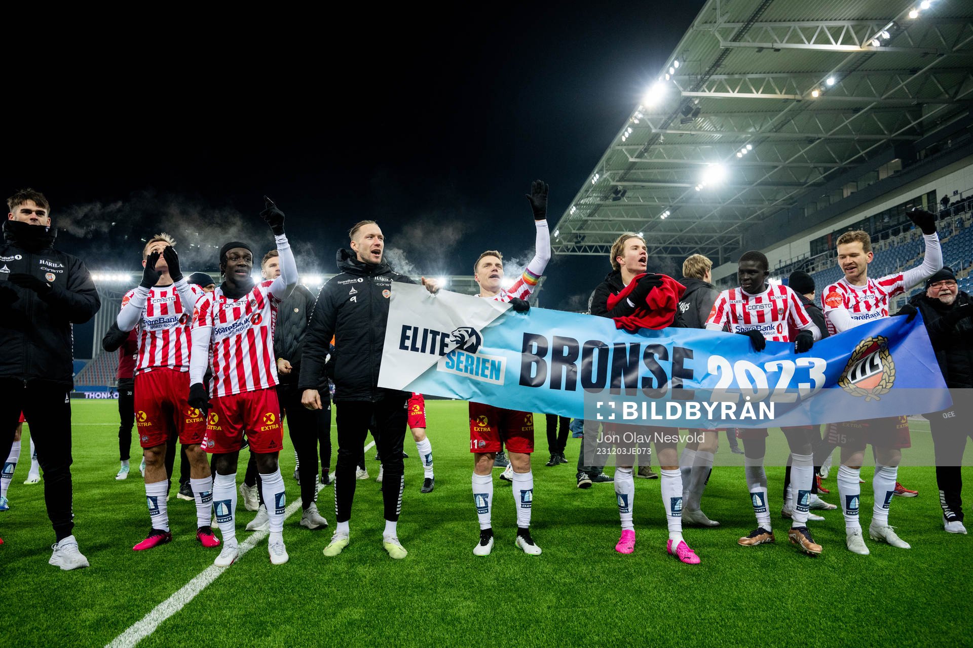 Players of Tromsø celebrate the bronze medal