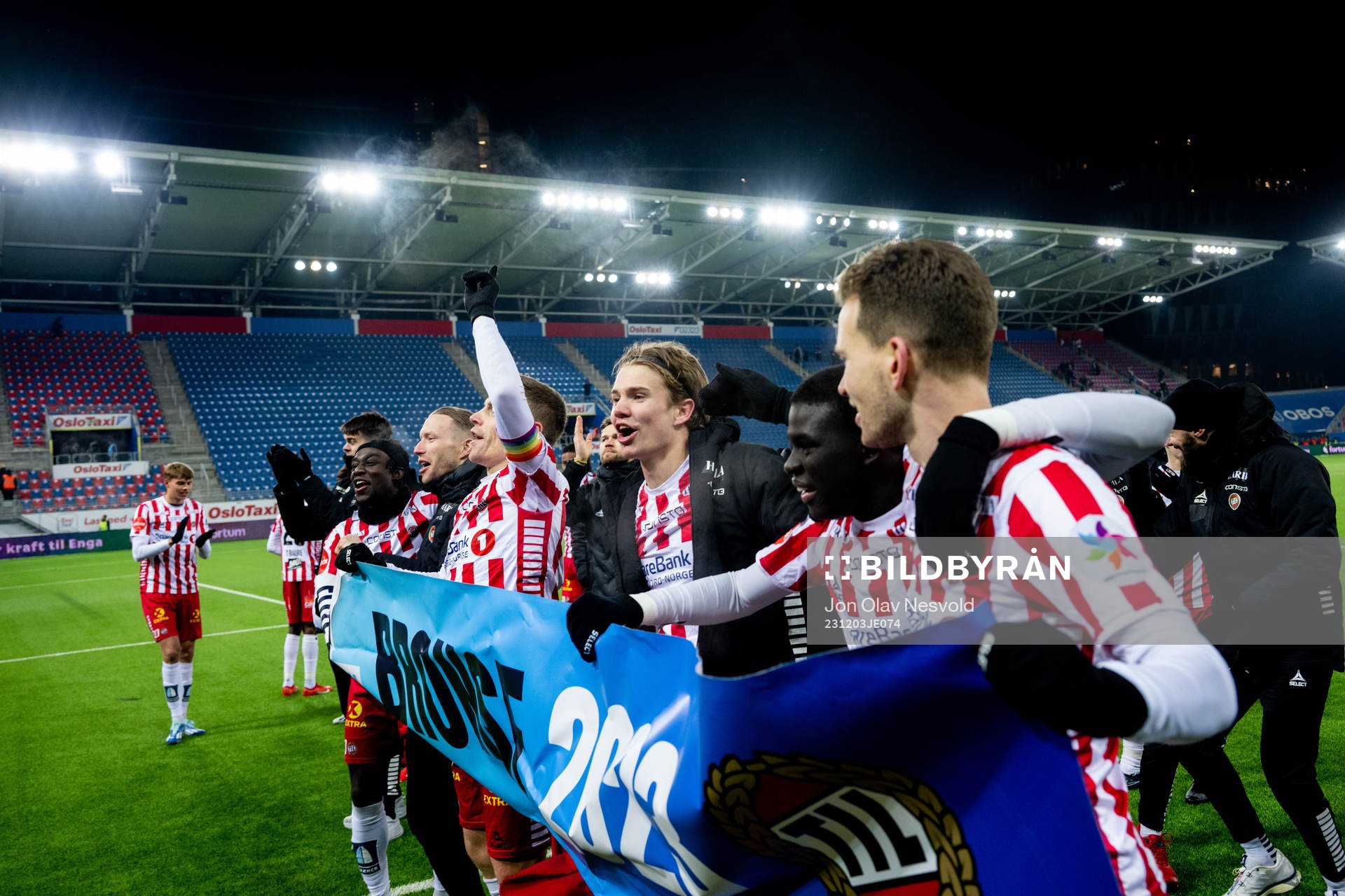 Players of Tromsø celebrate the bronze medal