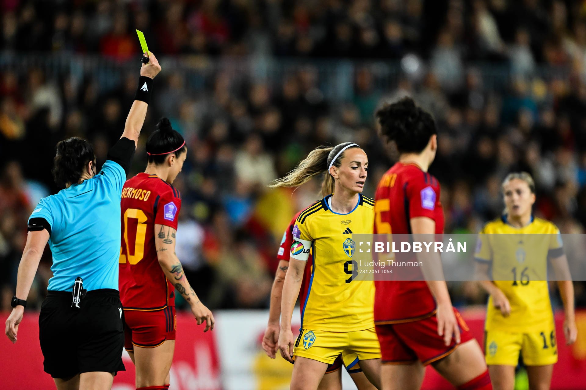 Kosovare Asllani of Sweden receives a yellow card