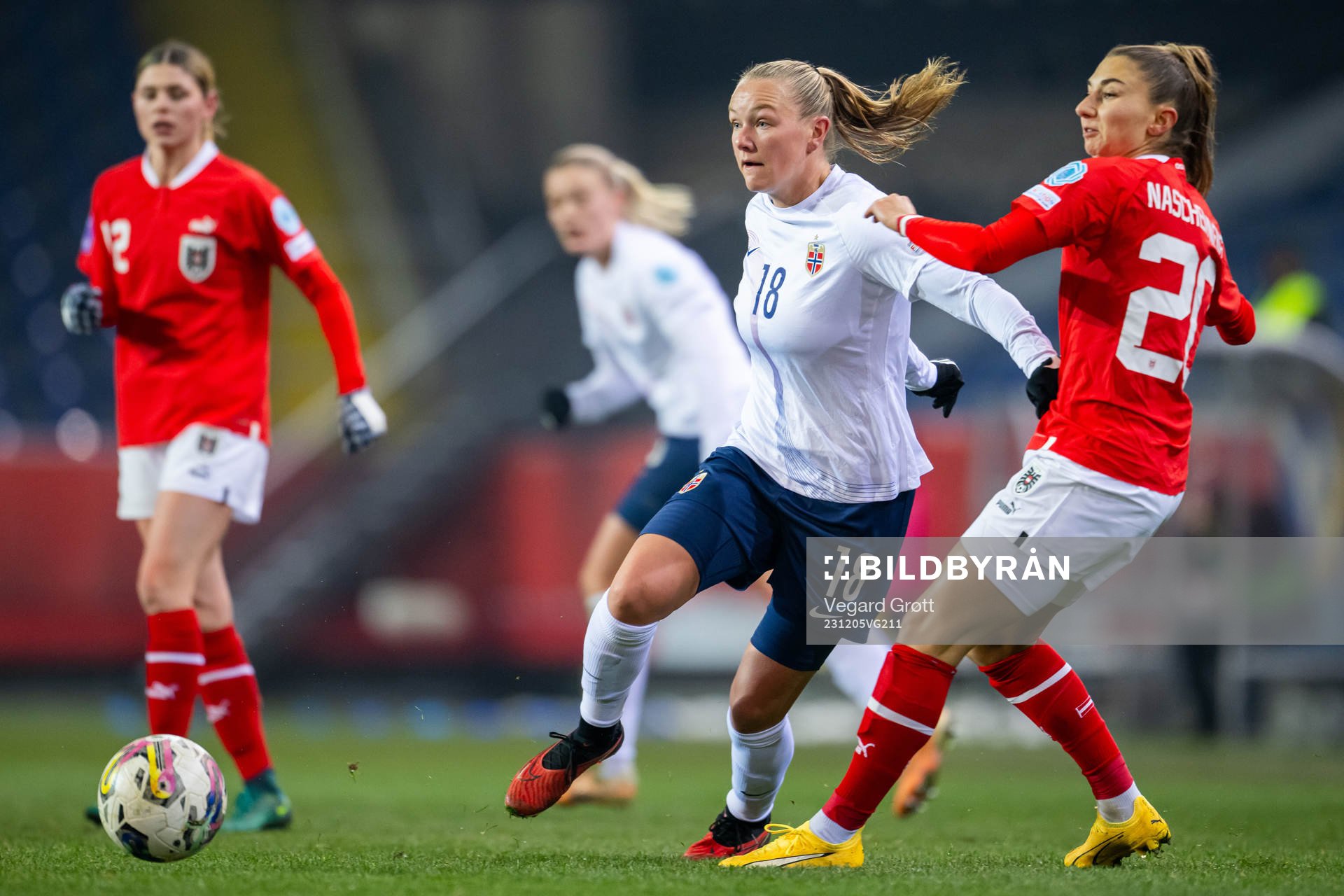 Frida Maanum of Norway and Katharina Naschenweng of Austria