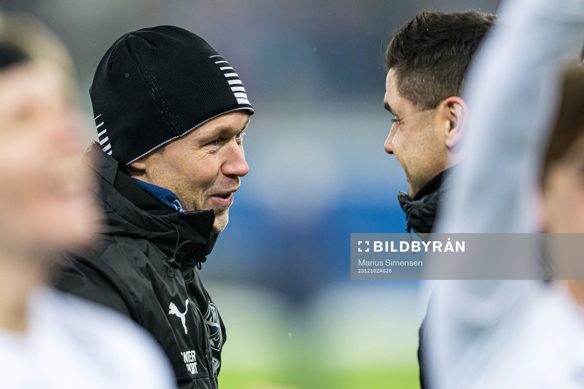 Amund Skiri, head coach of Kristiansund, and Eirik Hoseth, sports director of Kristiansund, celebrates promotion after the Eliteserien playoff football match between Vålerenga and Kristiansund on December 10, 2023 in Oslo.