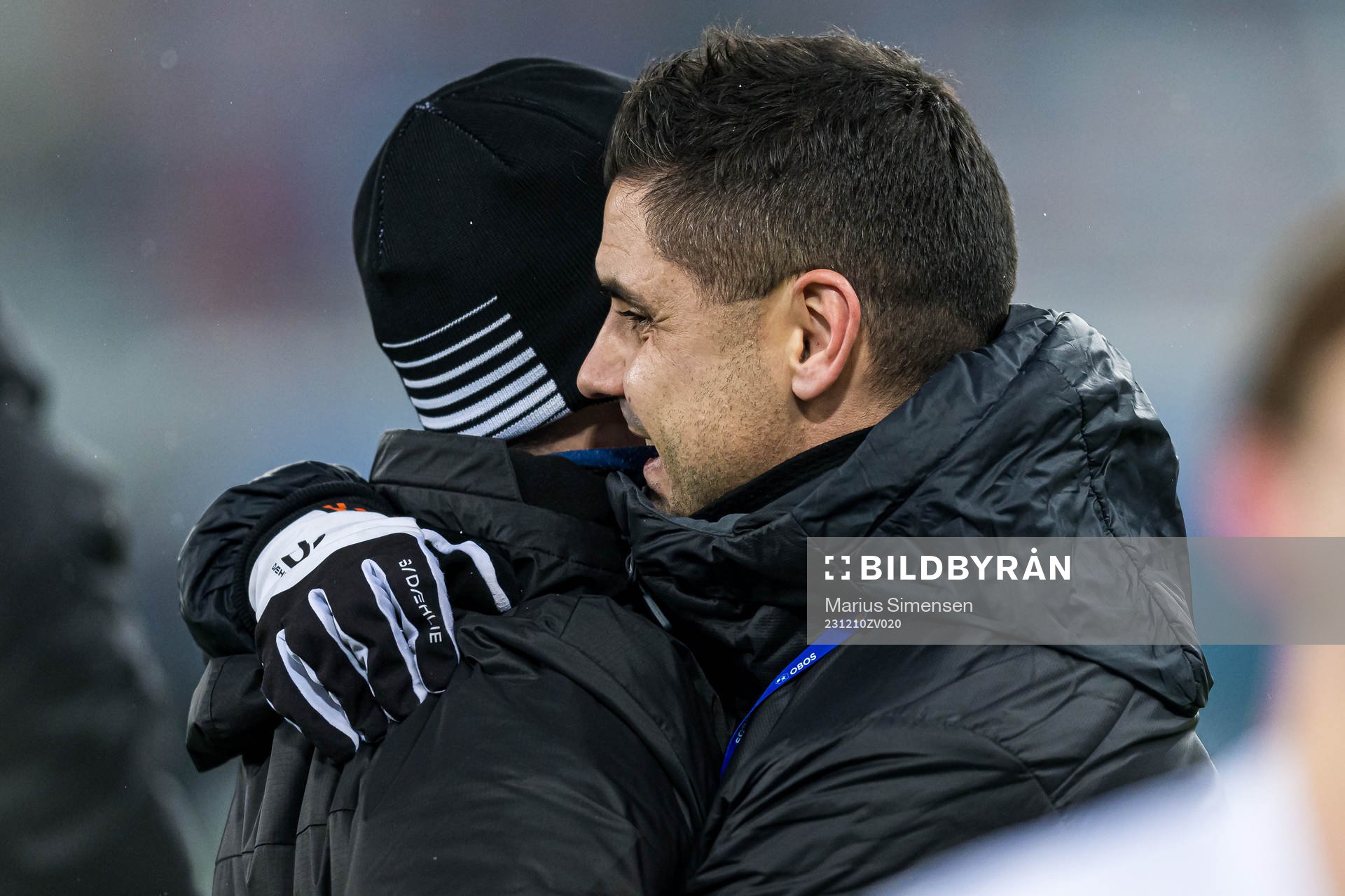 Amund Skiri, head coach of Kristiansund, and Eirik Hoseth, sports director of Kristiansund, celebrates promotion after the Eliteserien playoff football match between Vålerenga and Kristiansund on December 10, 2023 in Oslo.