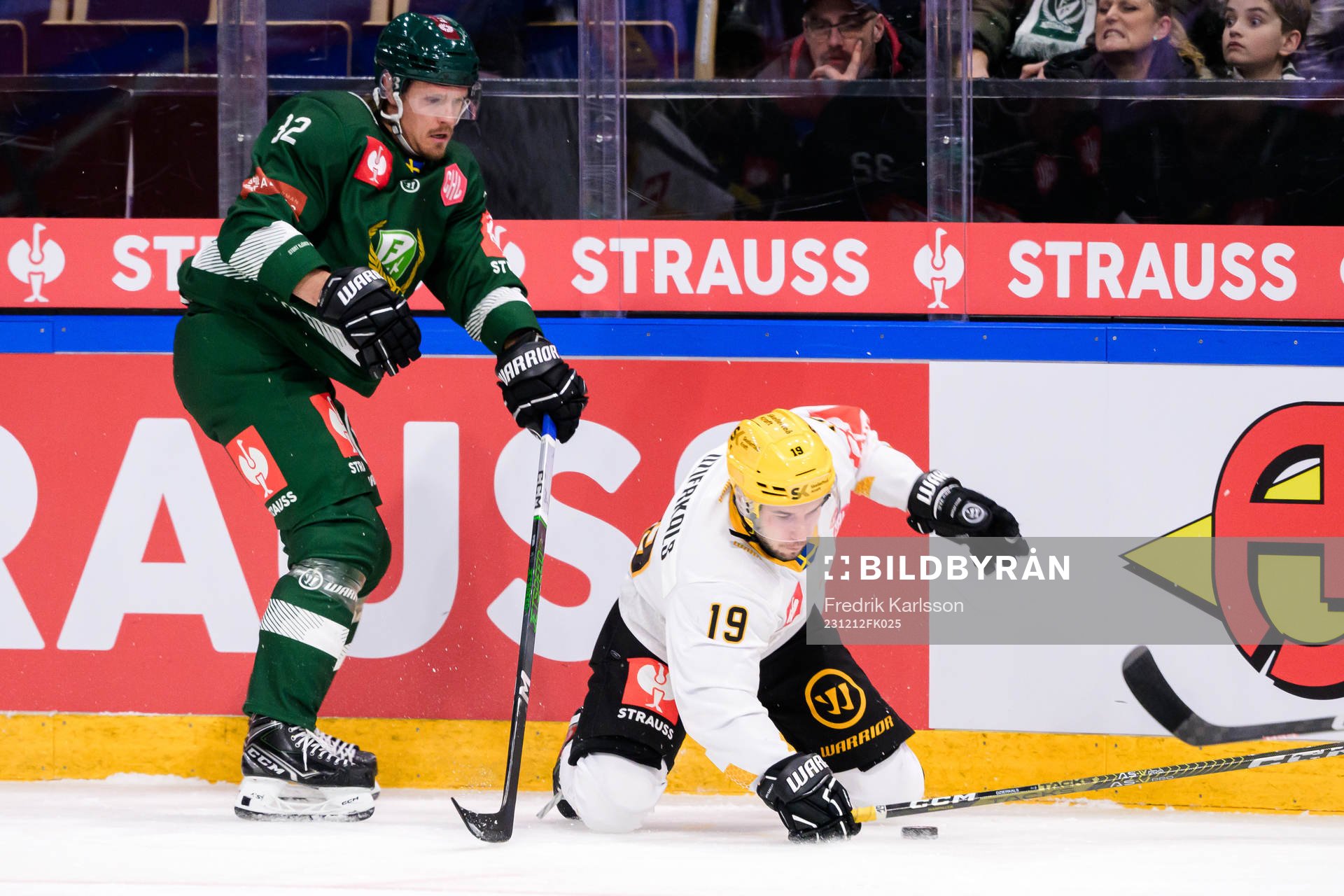 Magnus Nygren of Färjestad and Martins Dzierkals of