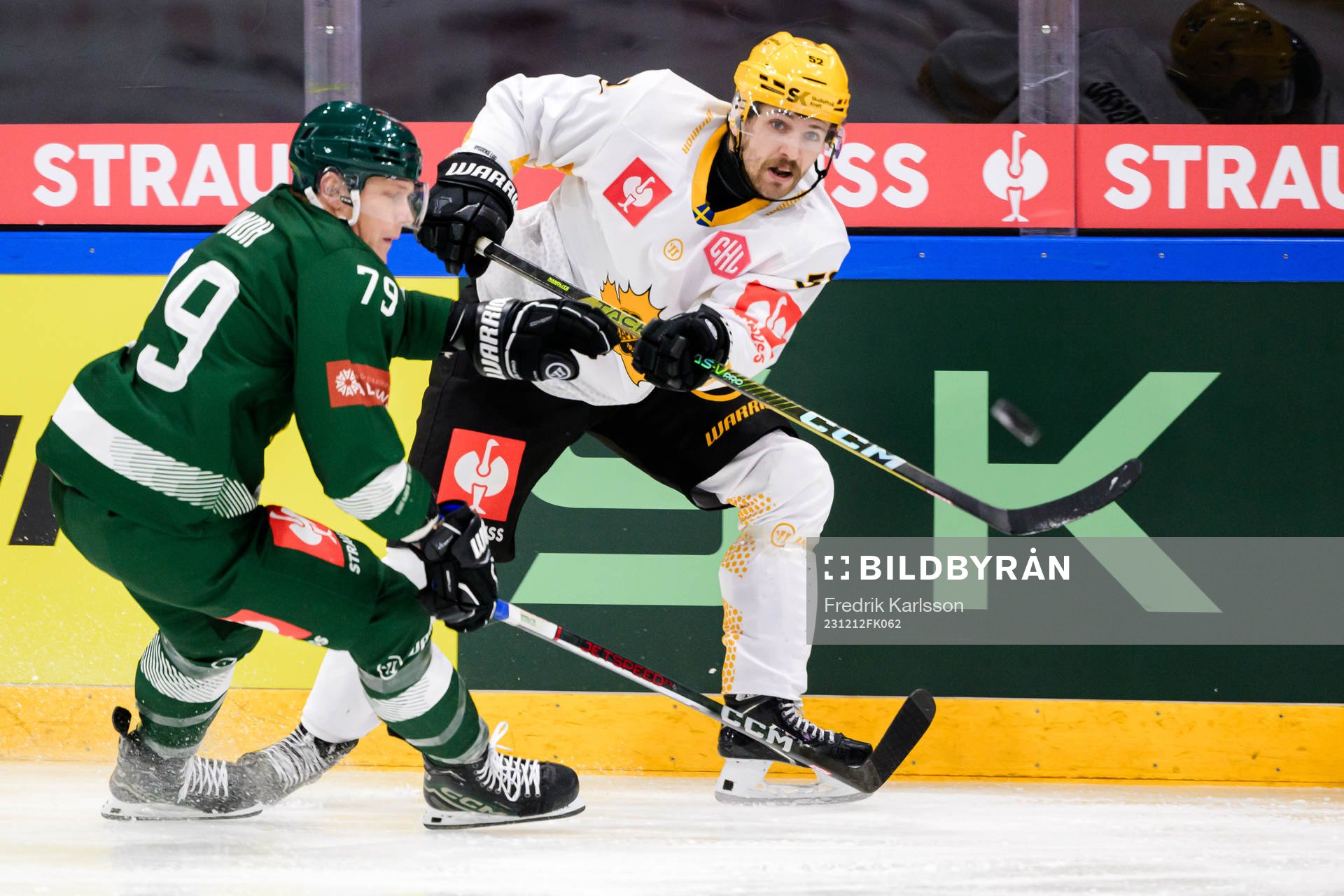 Patrik Lundh of Färjestad and Arvid Lundberg of Skellefteå