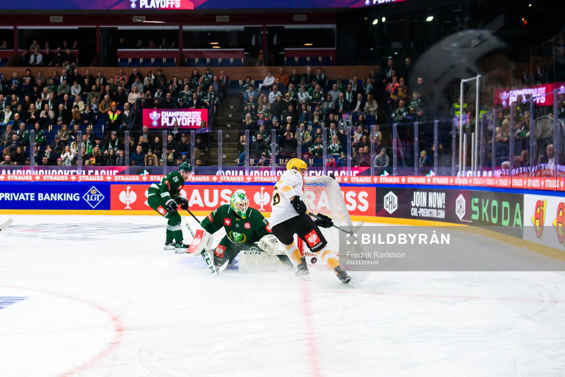 Simon Robertsson of Skellefteå and goaltender Maxime