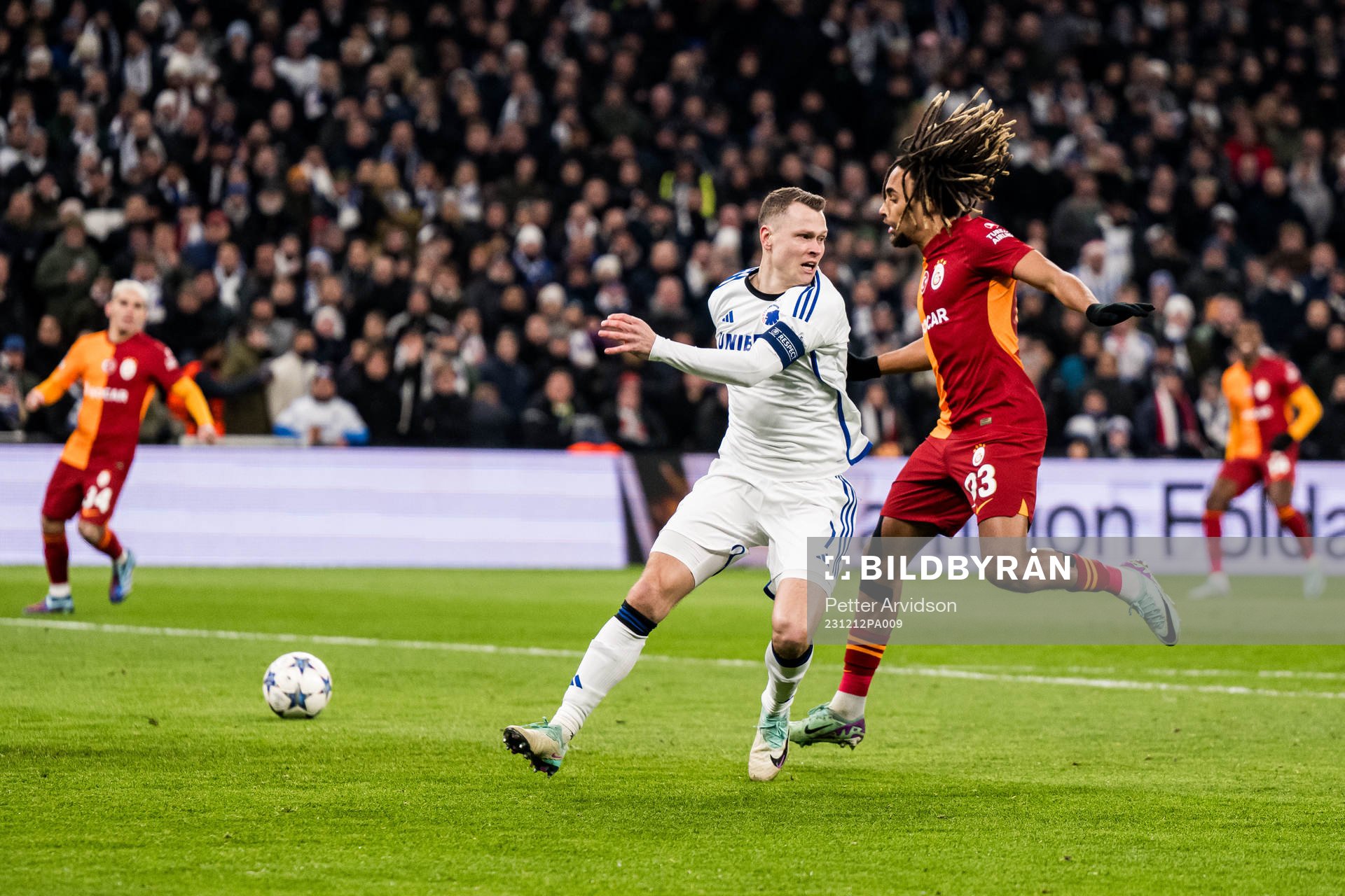 Viktor Claesson of FC Copenhagen and Kaan Ayhan of Galatasaray during the UEFA Champions League football match between FC Copenhagen and Galatasaray on December 12, 2023 in Copenhagen.