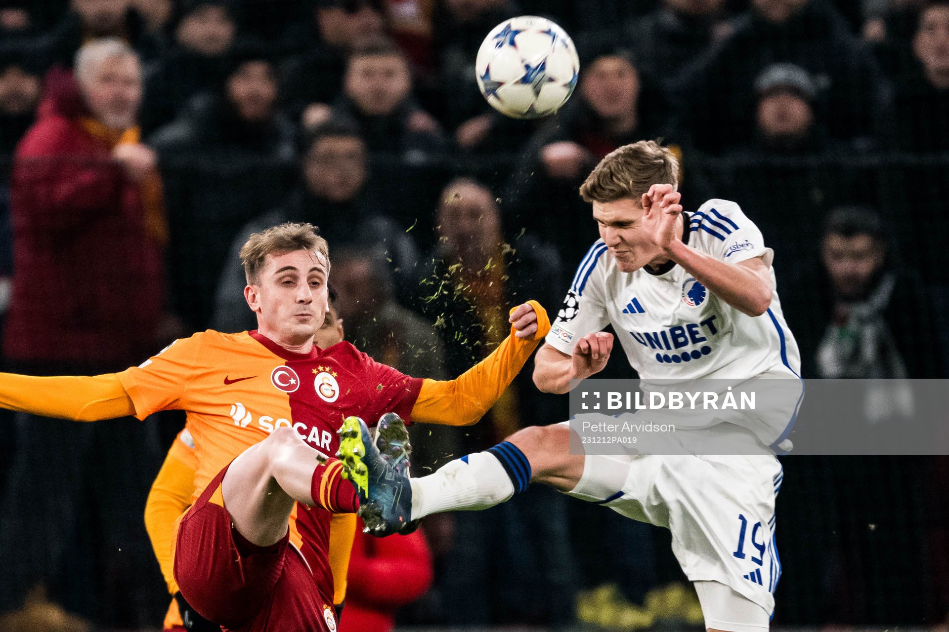 Kerem Akturkoglu of Galatasaray and Elias Jelert of FC Copenhagen during the UEFA Champions League football match between FC Copenhagen and Galatasaray on December 12, 2023 in Copenhagen.