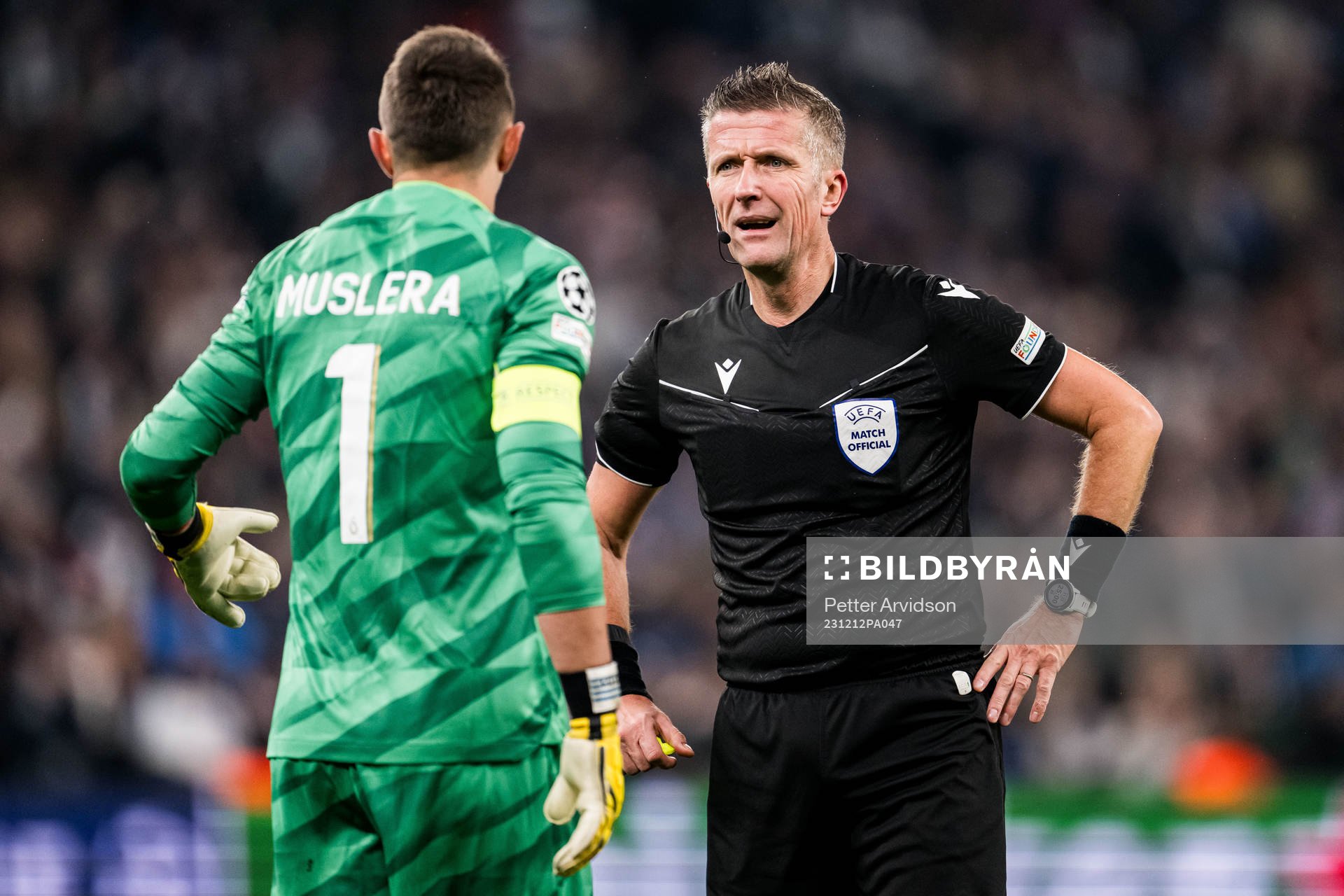 Referee Daniele Orsato and goalkeeper Fernando Muslera of Galatasaray during the UEFA Champions League football match between FC Copenhagen and Galatasaray on December 12, 2023 in Copenhagen.
