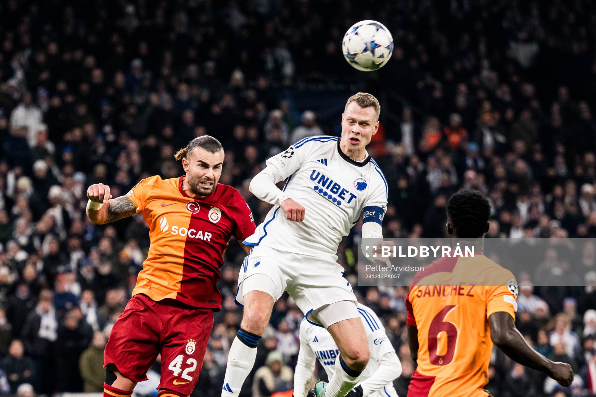 Abdulkerim Bardakci of Galatasaray and Viktor Claesson of FC Copenhagen during the UEFA Champions League football match between FC Copenhagen and Galatasaray on December 12, 2023 in Copenhagen. 