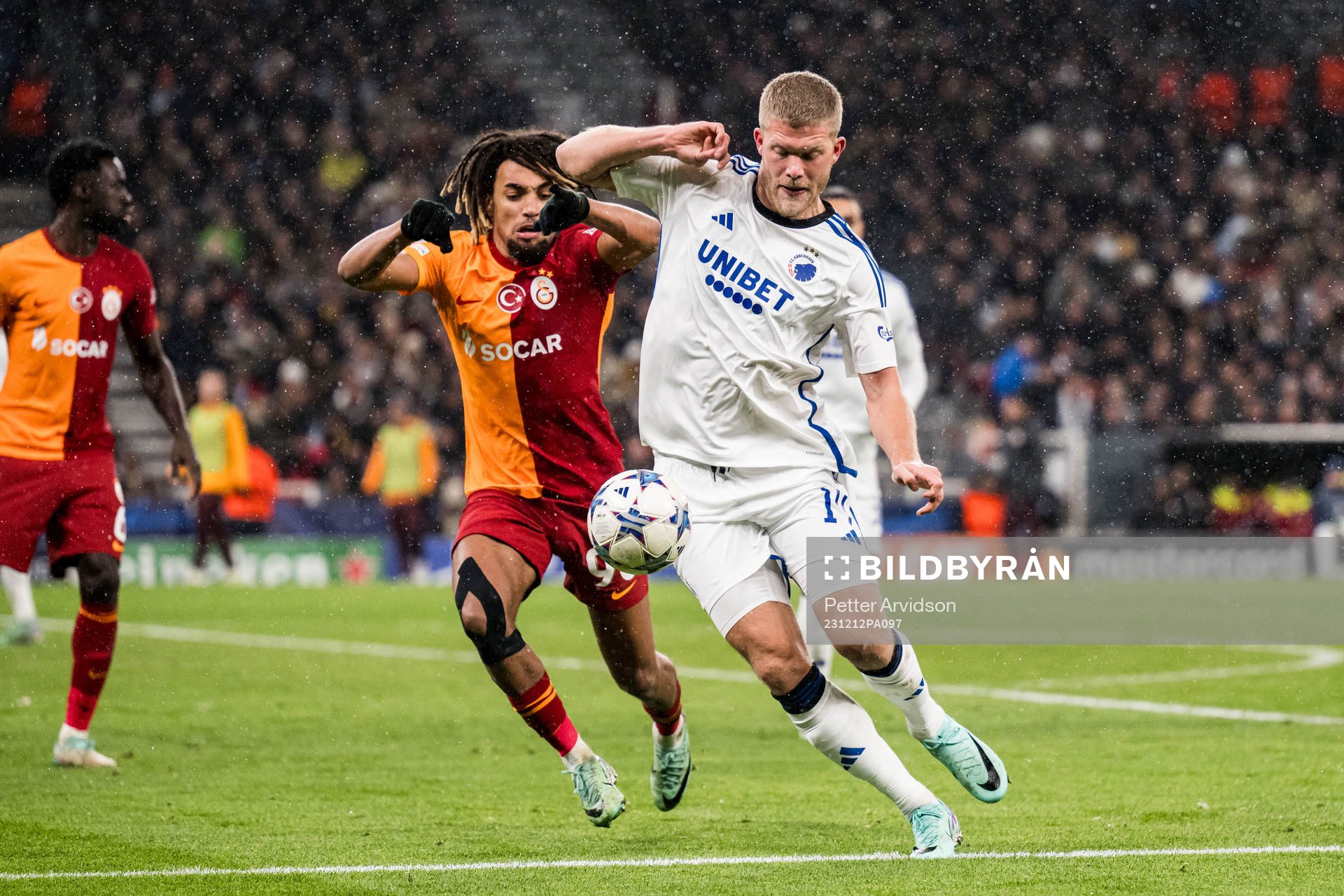 Sacha Boey of Galatasaray and Andreas Cornelius of FC