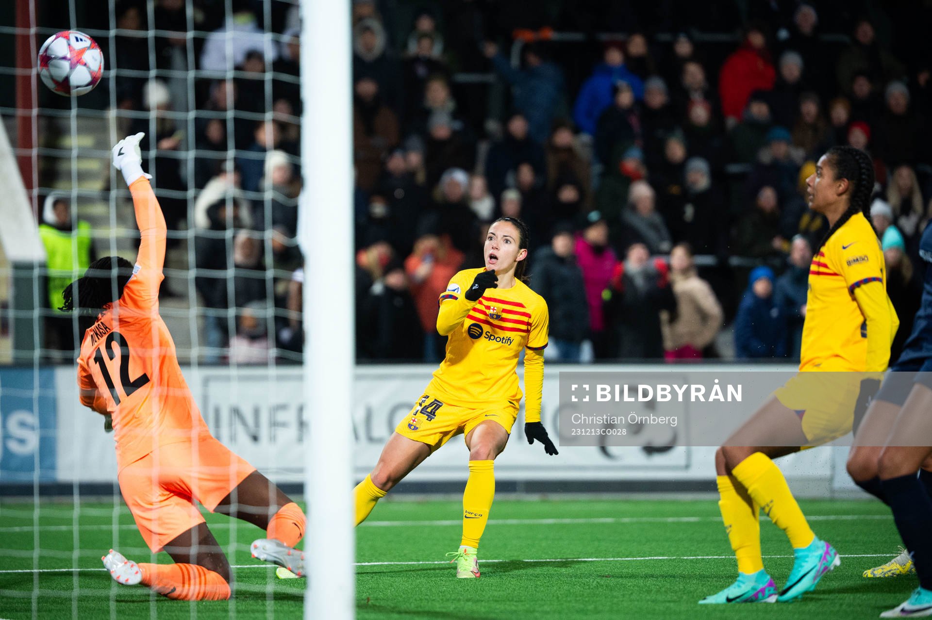 Aitana Bonmati of Barcelona scores  0-4 behind goalkeeper