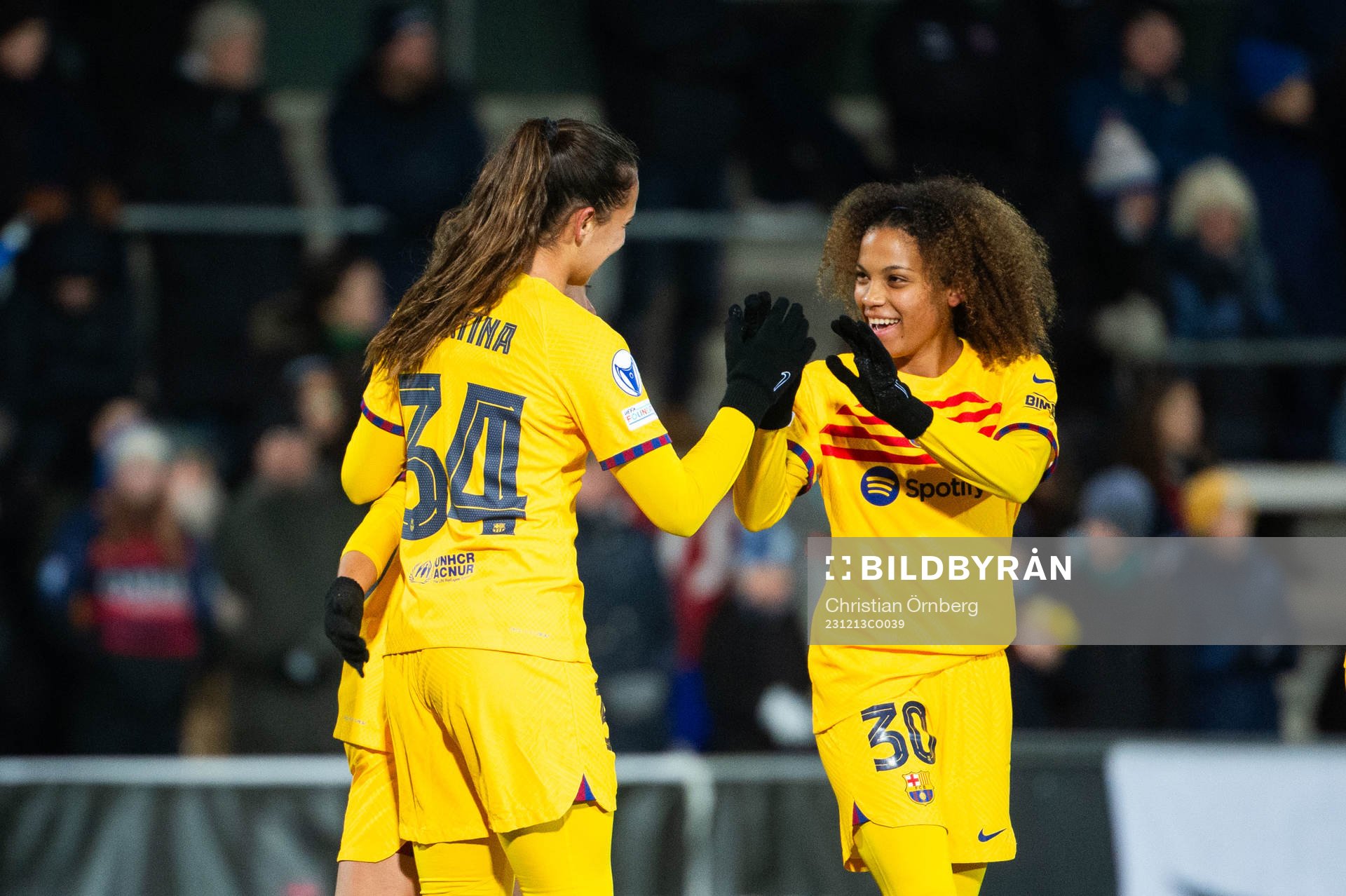 Martina and Vicky Lopez of Barcelona celebrate