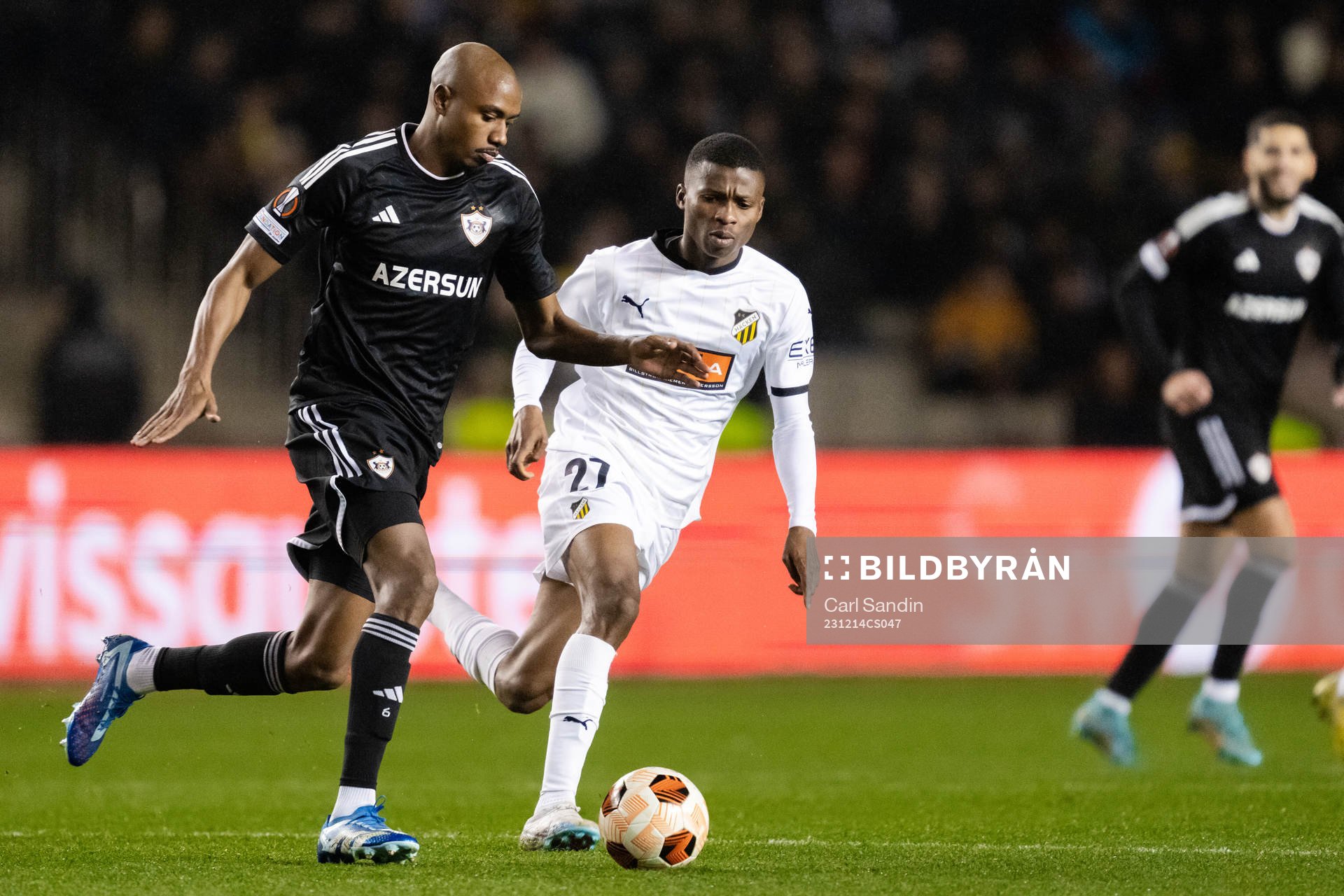 Julio Romao of Qarabag and Akoua Romeo Amane of Häcken
