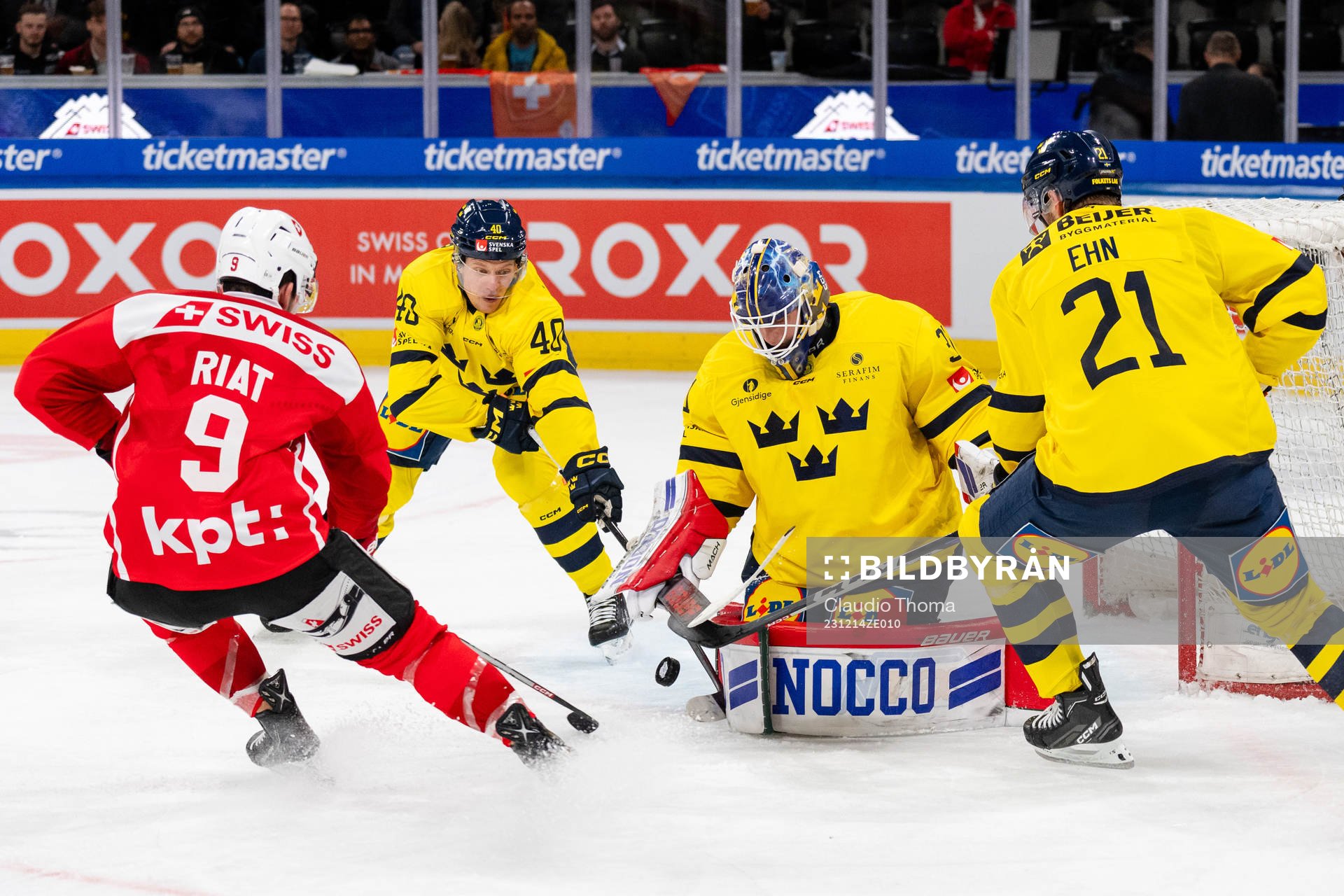 Lawrence Pilut, goaltender Lars Johansson and Christoffer