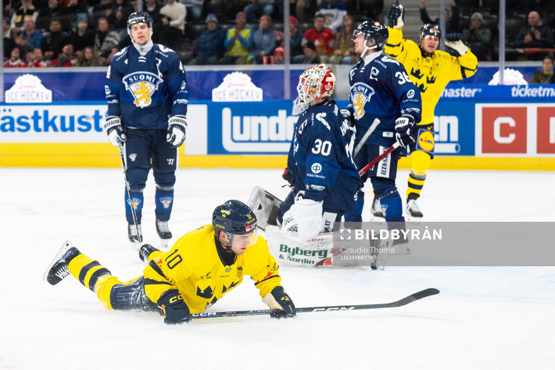 Andreas Wingerli of Sweden scores 1-1  in the ice hockey