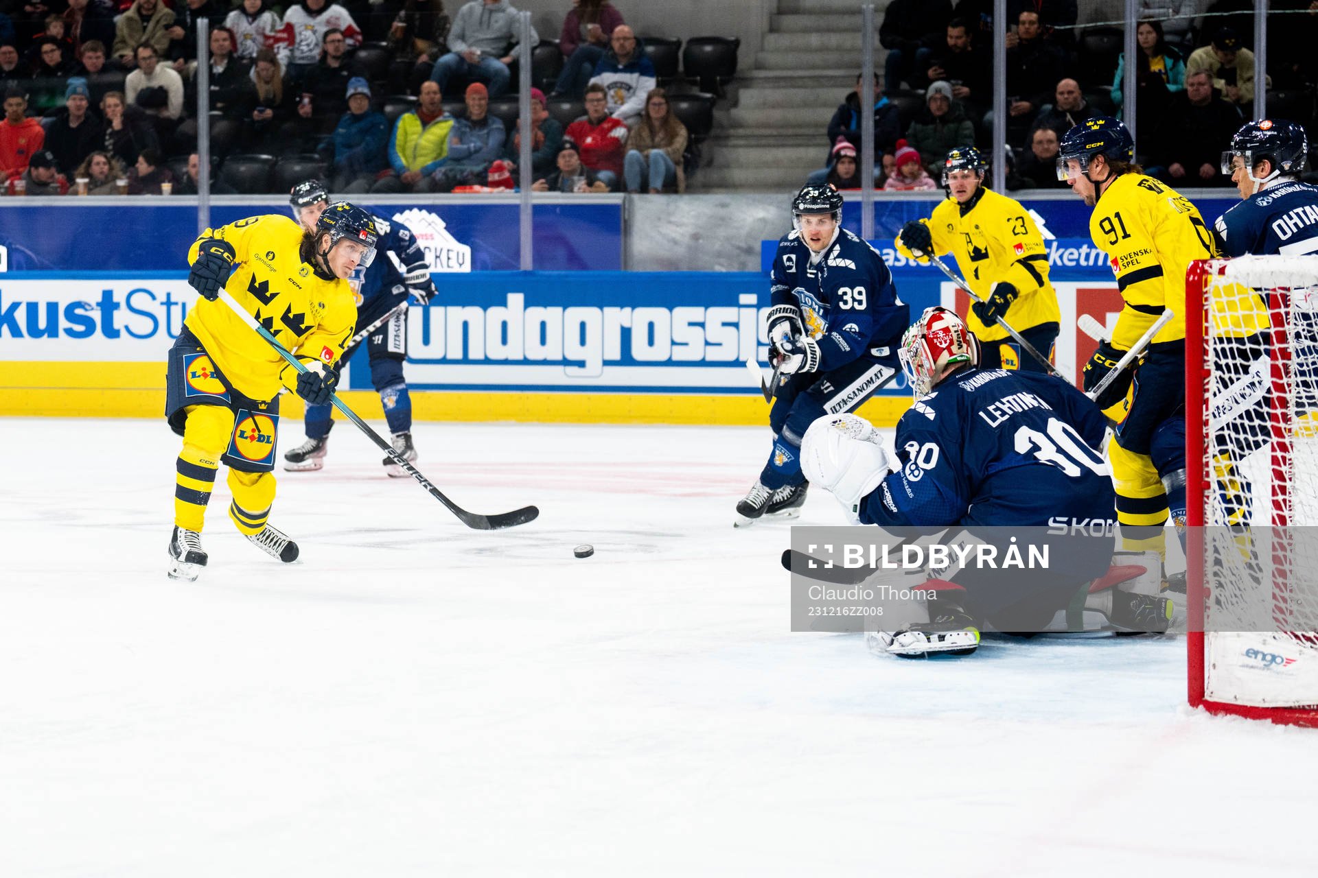Marcus Sörensen of Sweden against goaltender Lassi