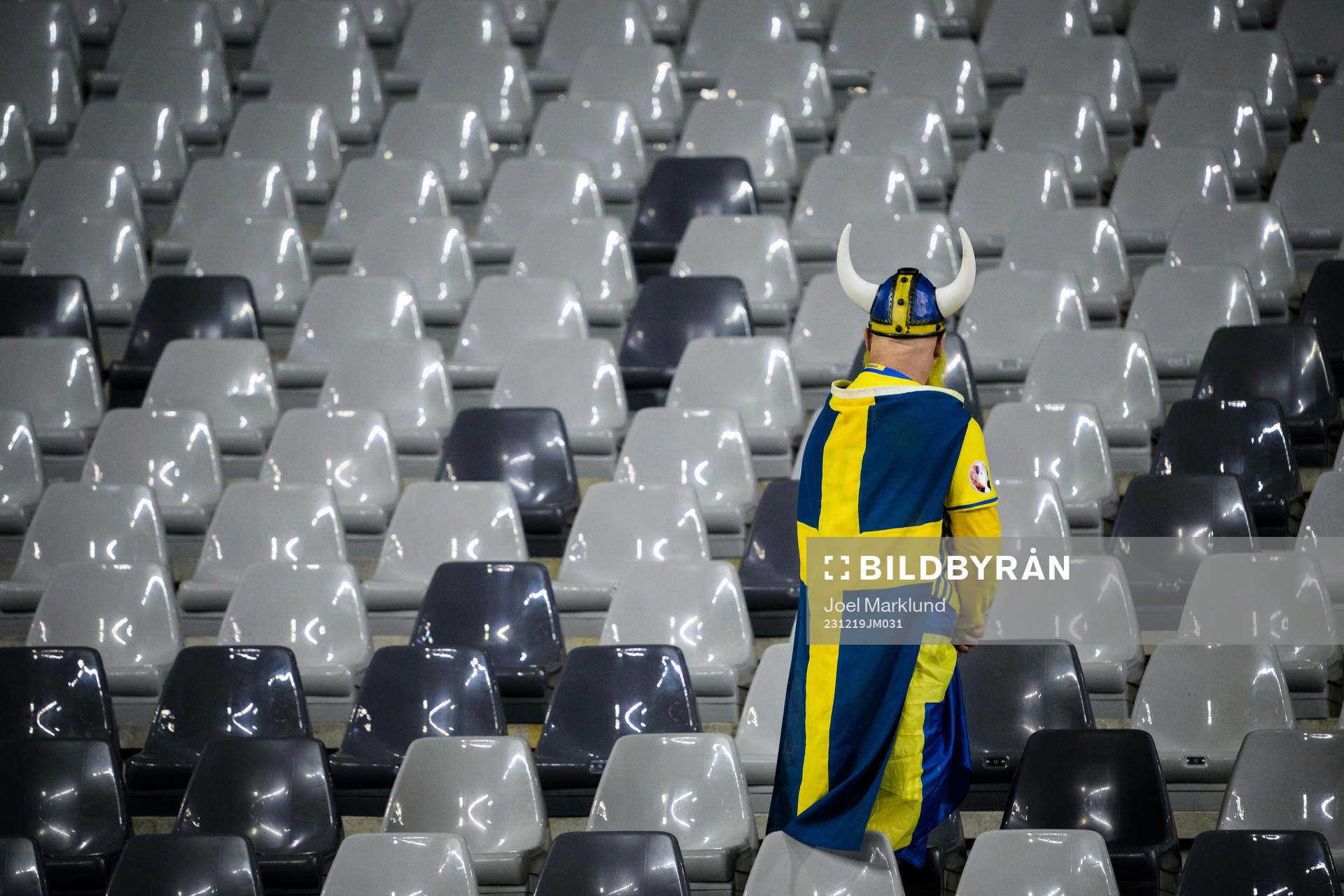 This picture is part of Bildbyrån’s selection of best sports photos from 2023. Originally published 231016 A Swedish fan in the stands waiting to leave the arena after the suspended UEFA Euro Qualifier football match between Belgium and Sweden on October 16, 2023 in Brussels, Belgium. The match was suspended because of a shooting of Swedish supporters earlier in the day.