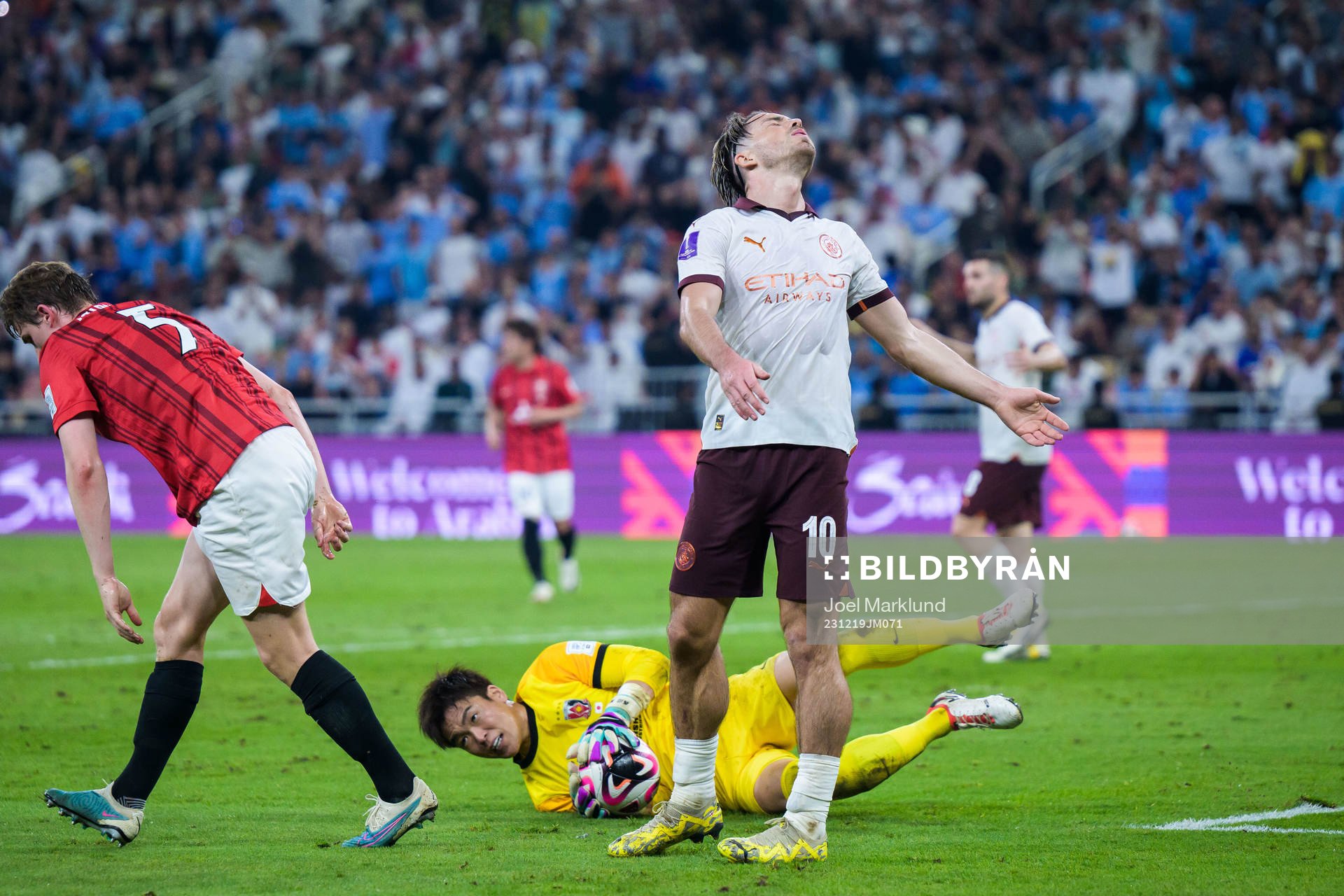 Jack Grealish of Manchester City looks dejected