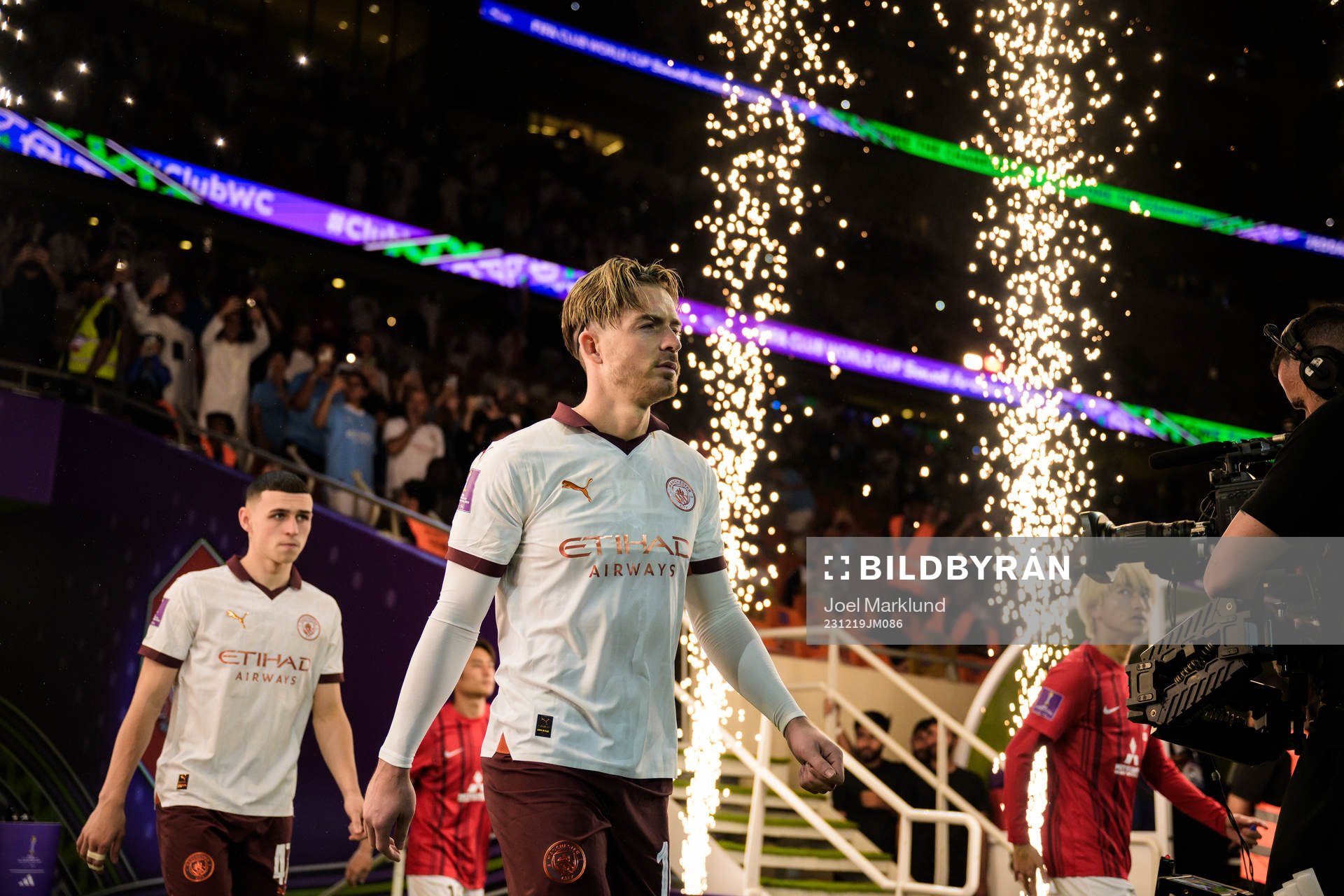 Phil Foden and Jack Grealish of Manchester City enter the
