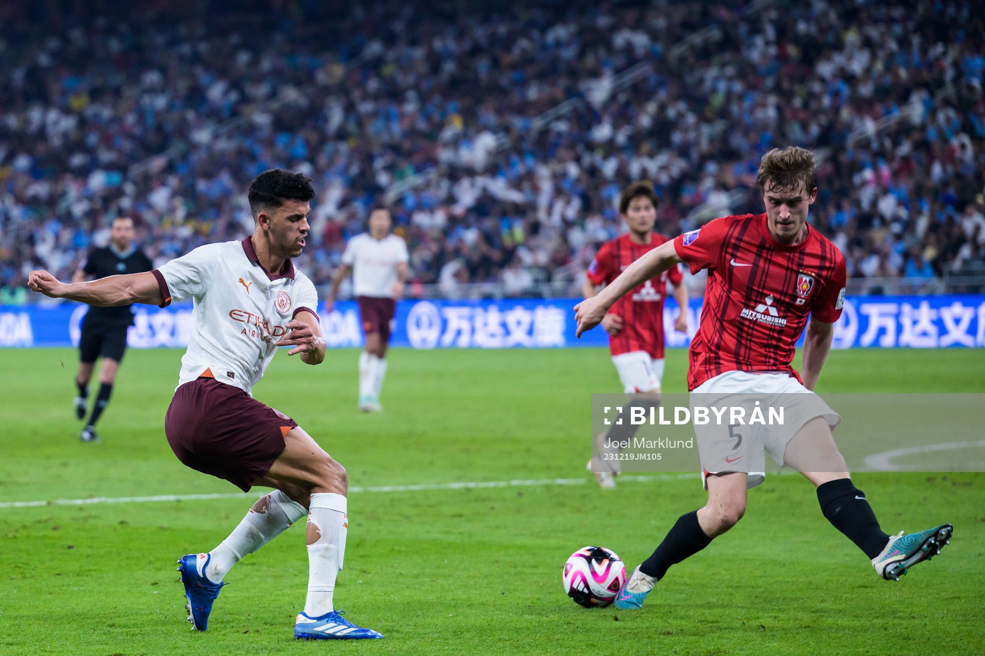 Matheus Nunes of Manchester City and Marius Høibråten of