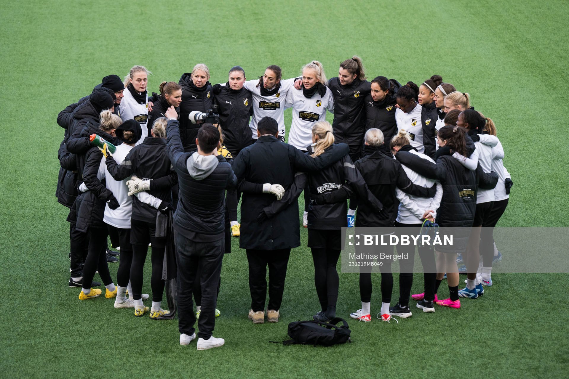 Players and coaches gather